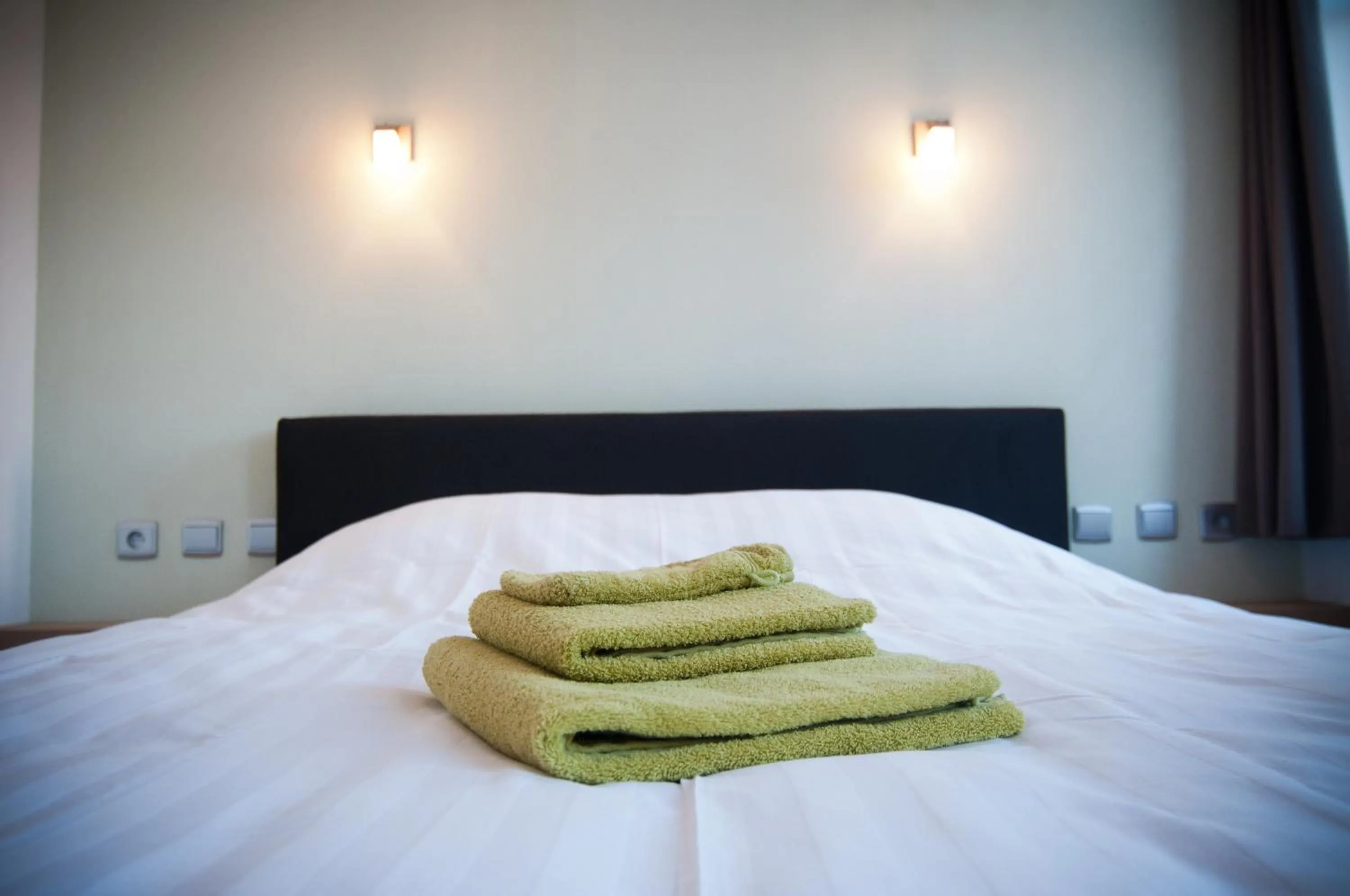 Bed in Apartment De Maasnacht