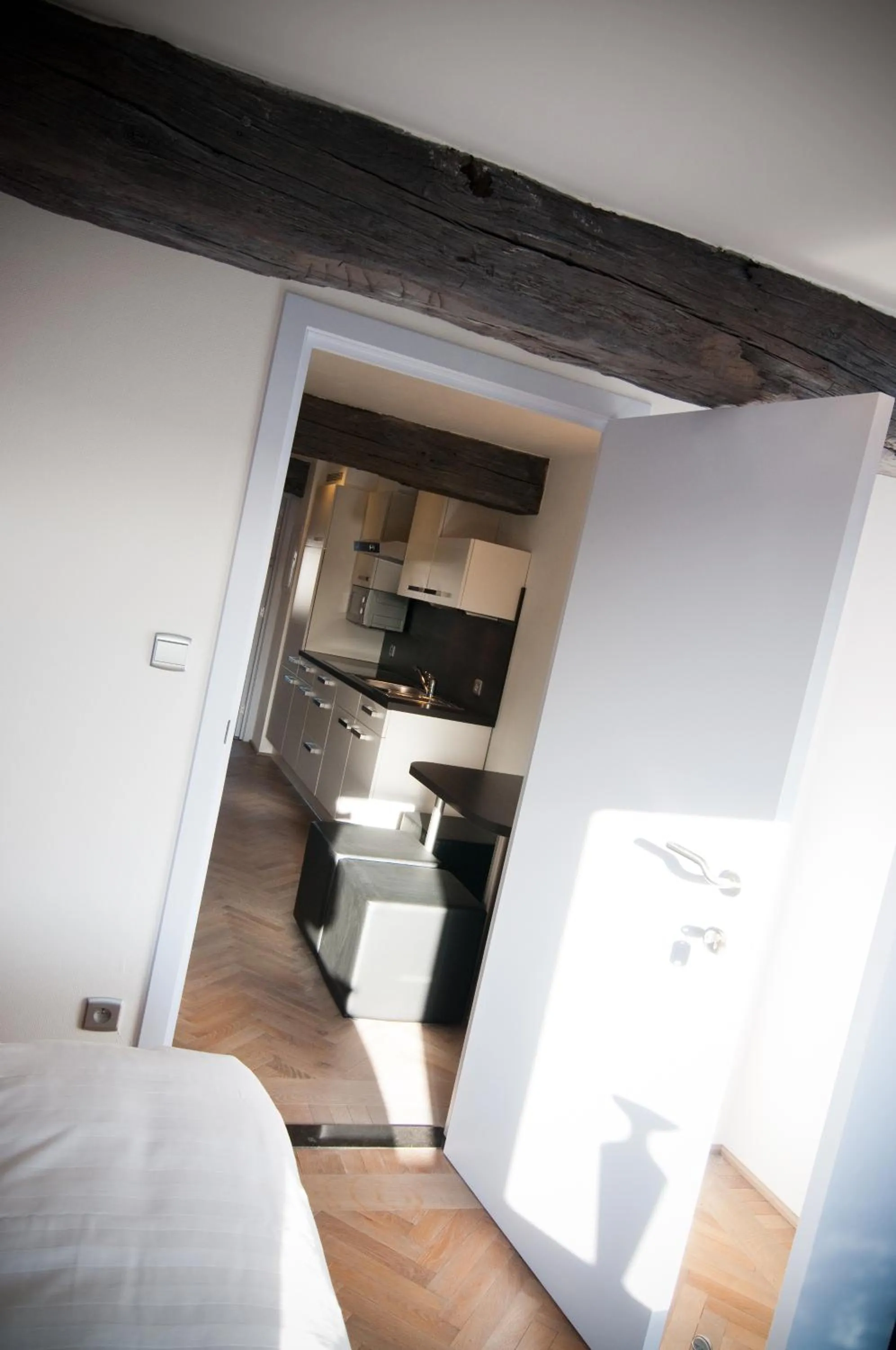 Kitchen or kitchenette, Bed in Apartment De Maasnacht