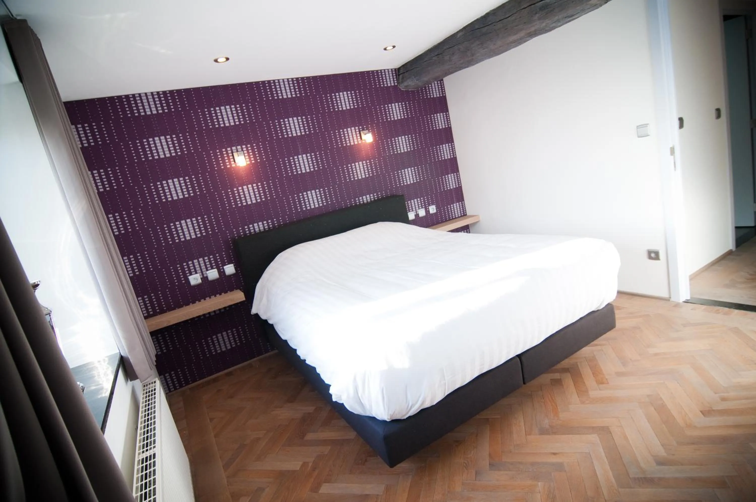 Bed in Apartment De Maasnacht