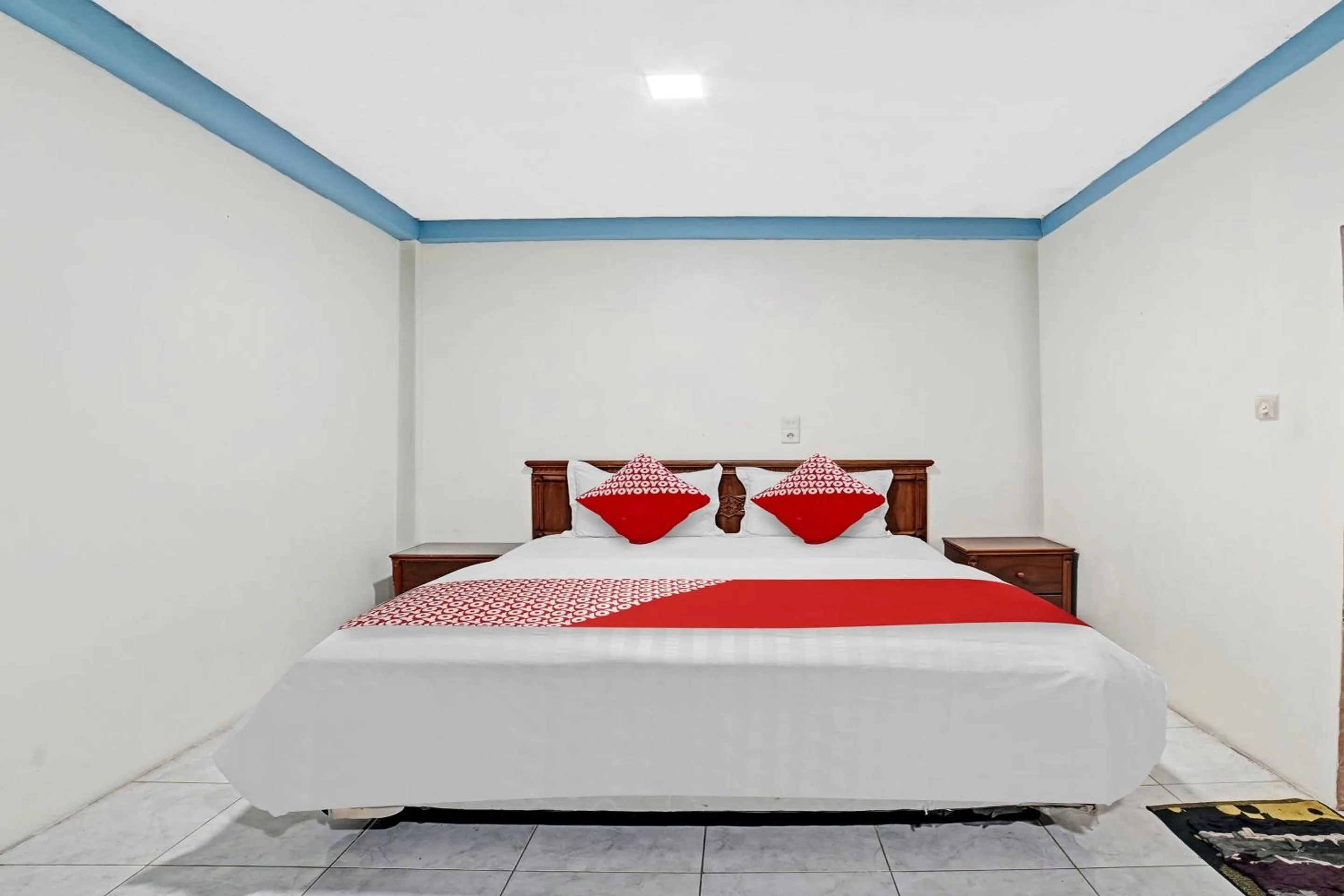 Bedroom, Bed in Hotel O Wisma Kuta Karang Baru