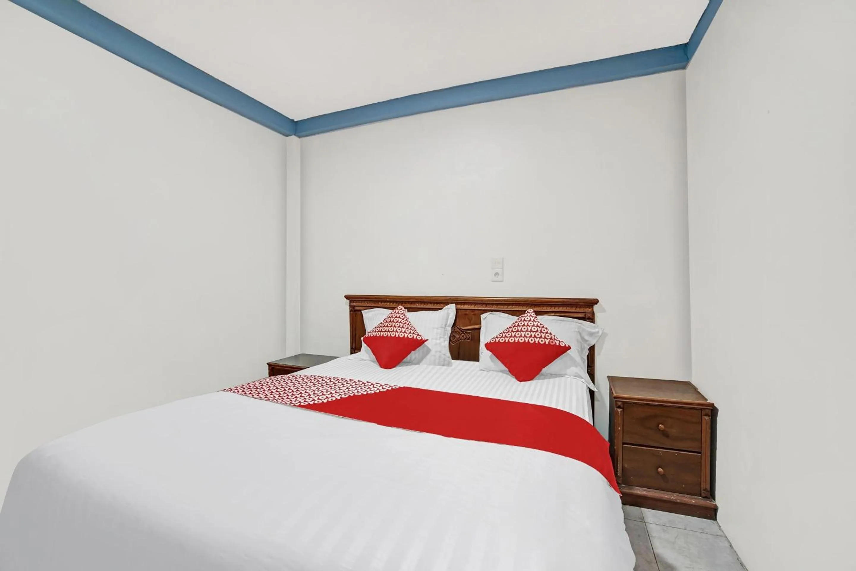 Bedroom, Bed in Hotel O Wisma Kuta Karang Baru