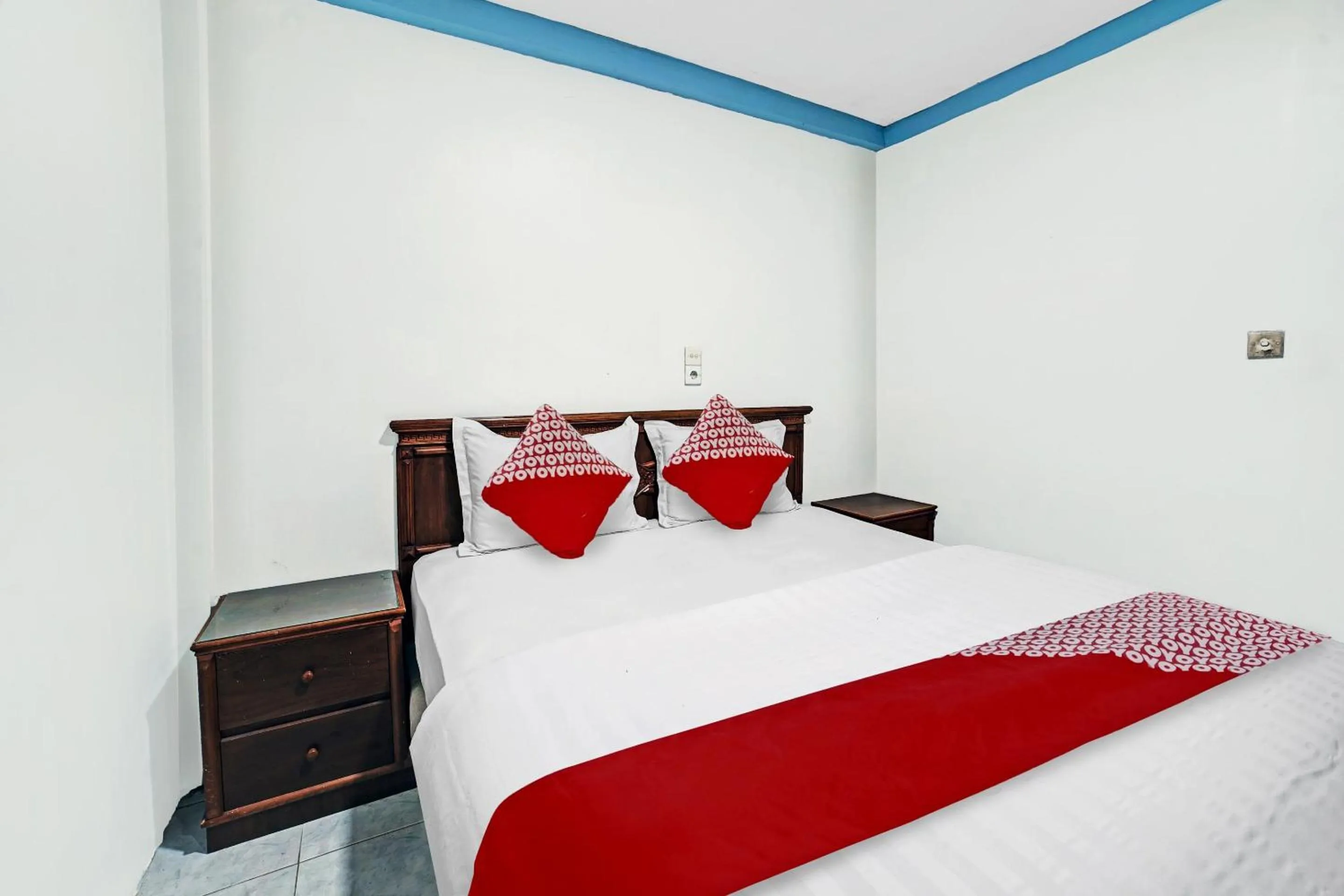 Bedroom, Bed in Hotel O Wisma Kuta Karang Baru