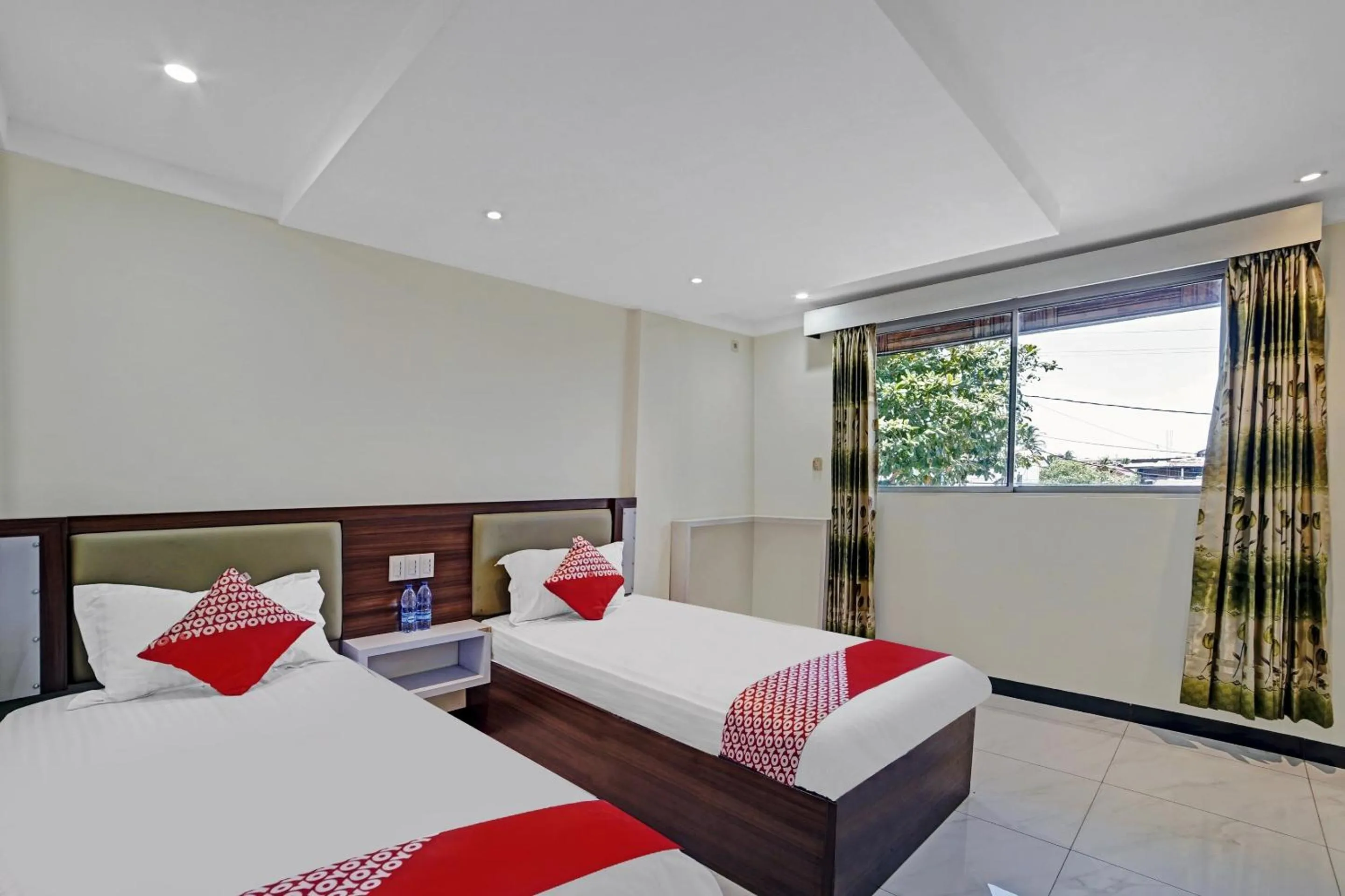 Bedroom, Bed in Hotel O Wisma Kuta Karang Baru