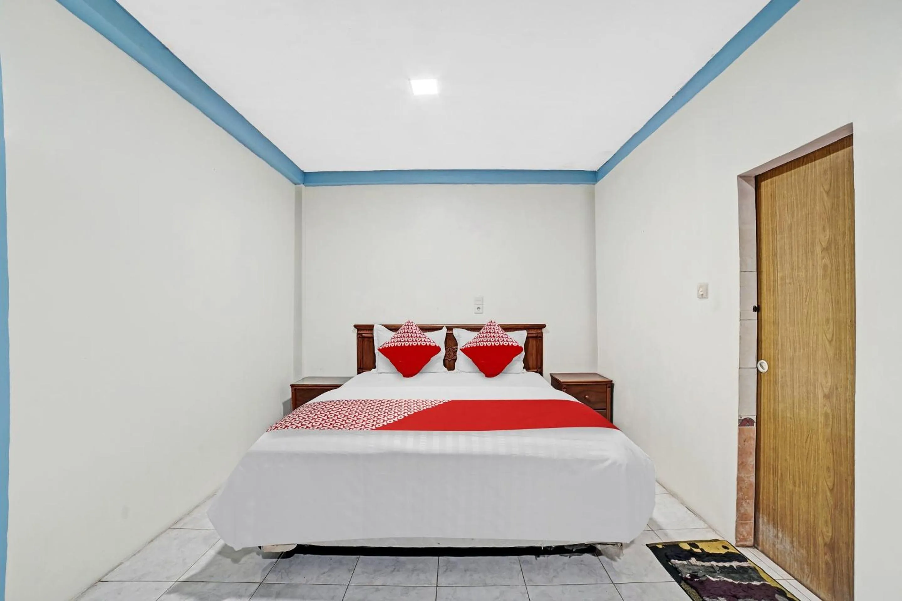 Bedroom, Bed in Hotel O Wisma Kuta Karang Baru