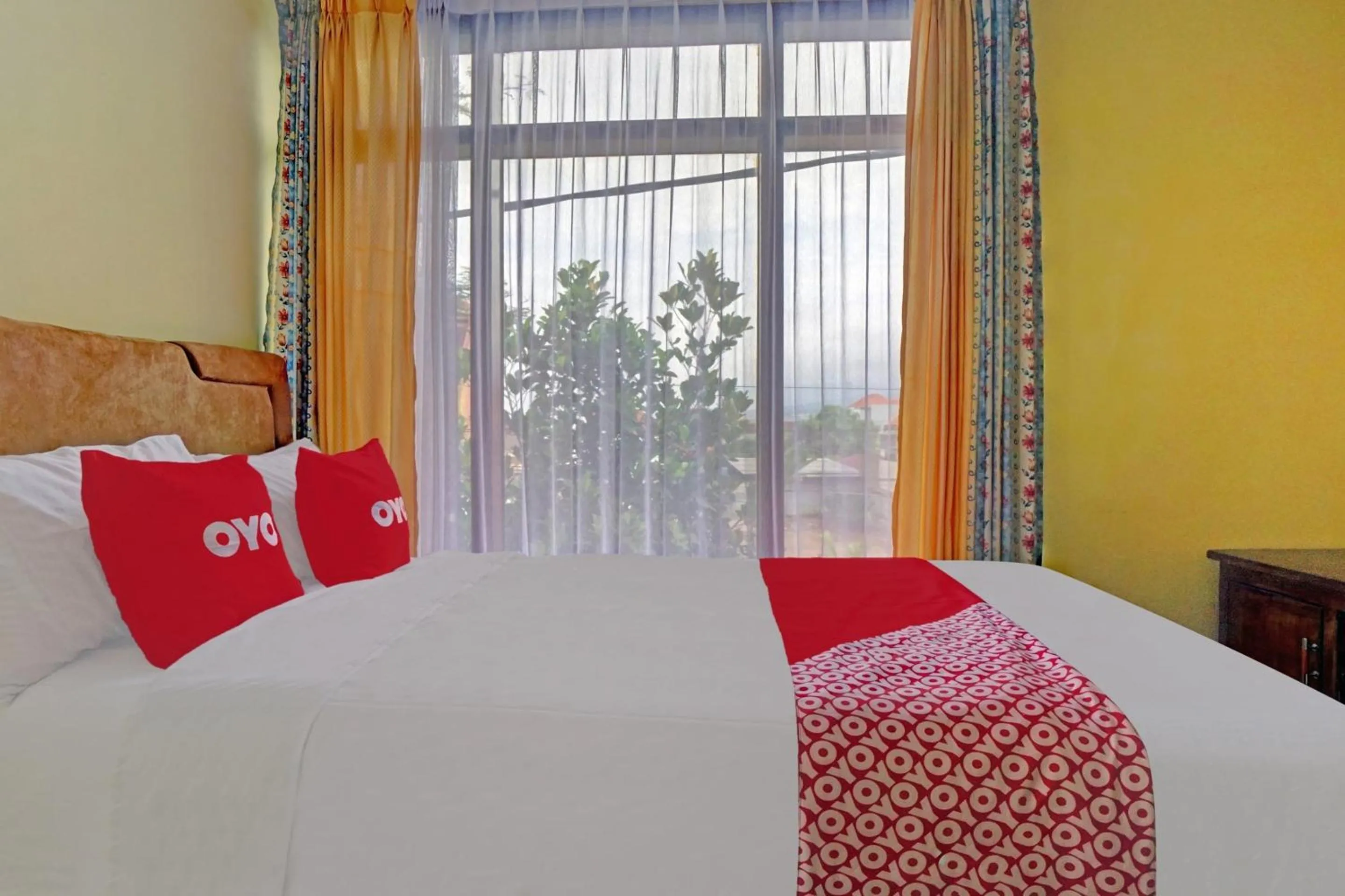 Bedroom, Bed in Hotel O Harwin Homestay