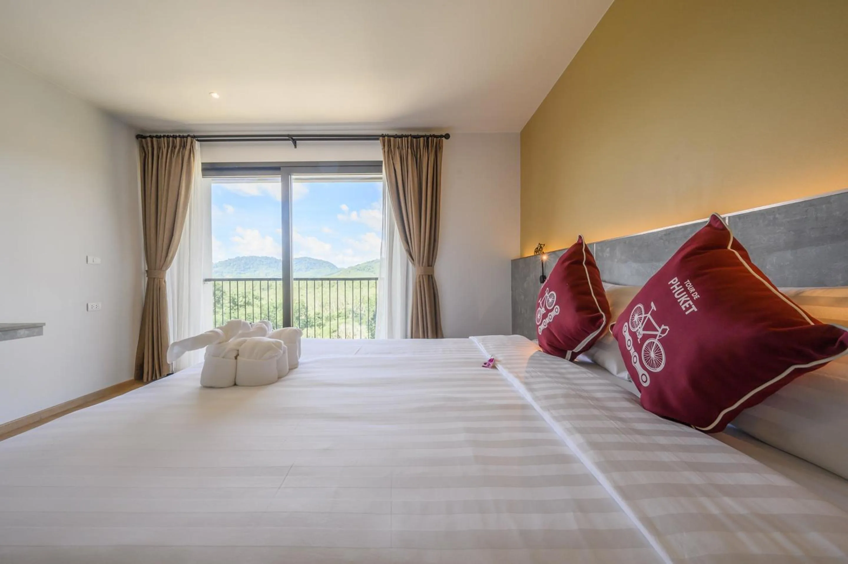 Bed in Tour De Phuket Hotel - SHA Plus