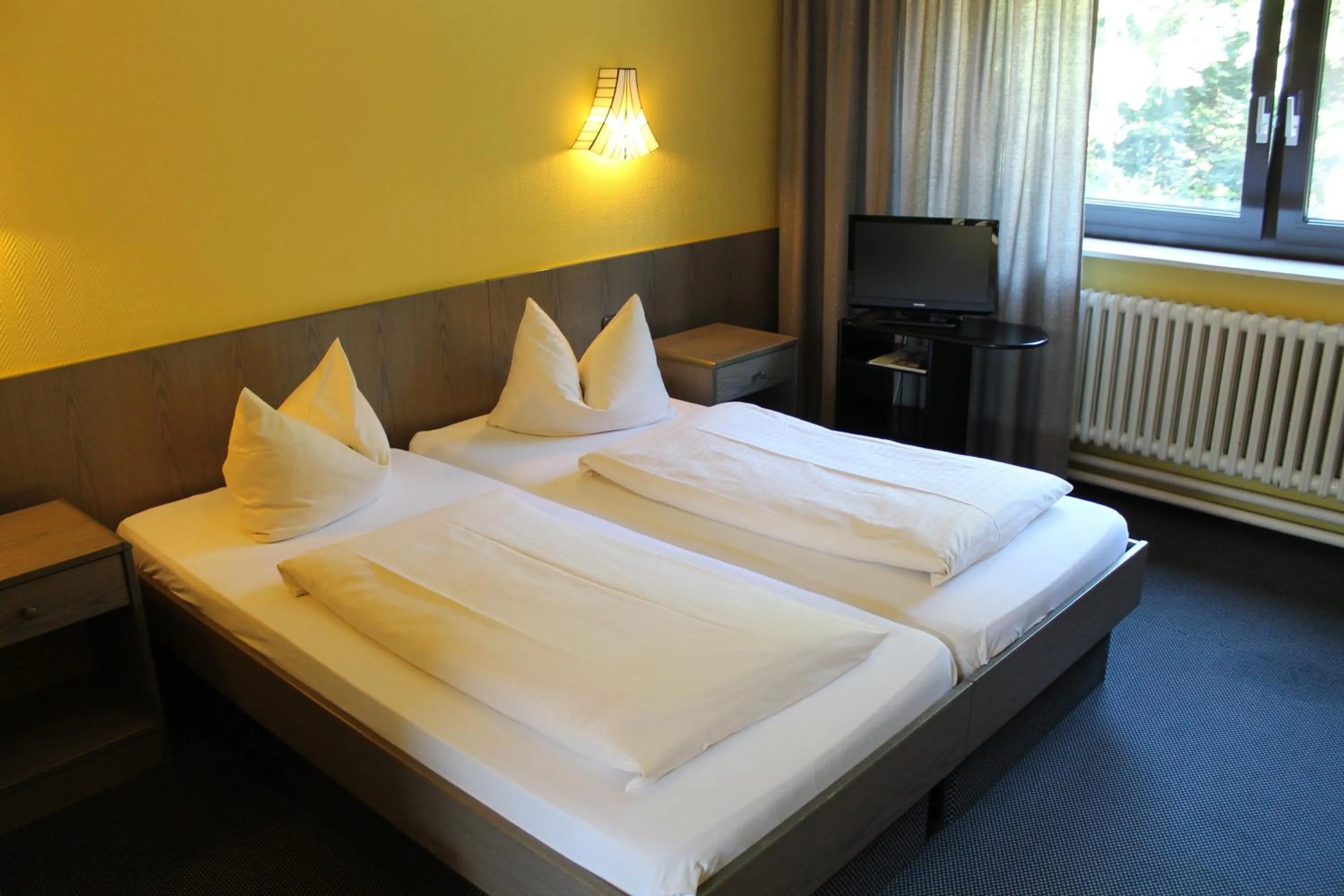 Bed in Hotel Grunewald