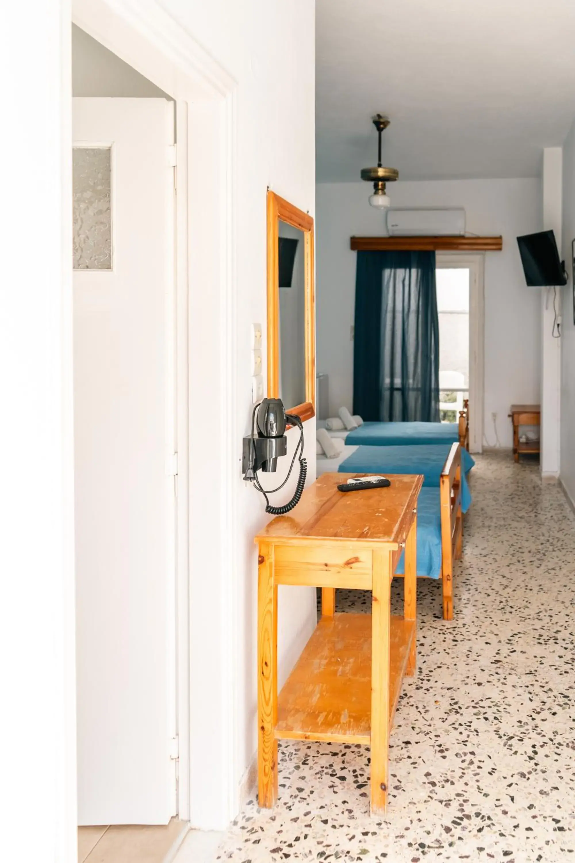 Economy Triple Room in Dilino Economy Triple Room in Dilino