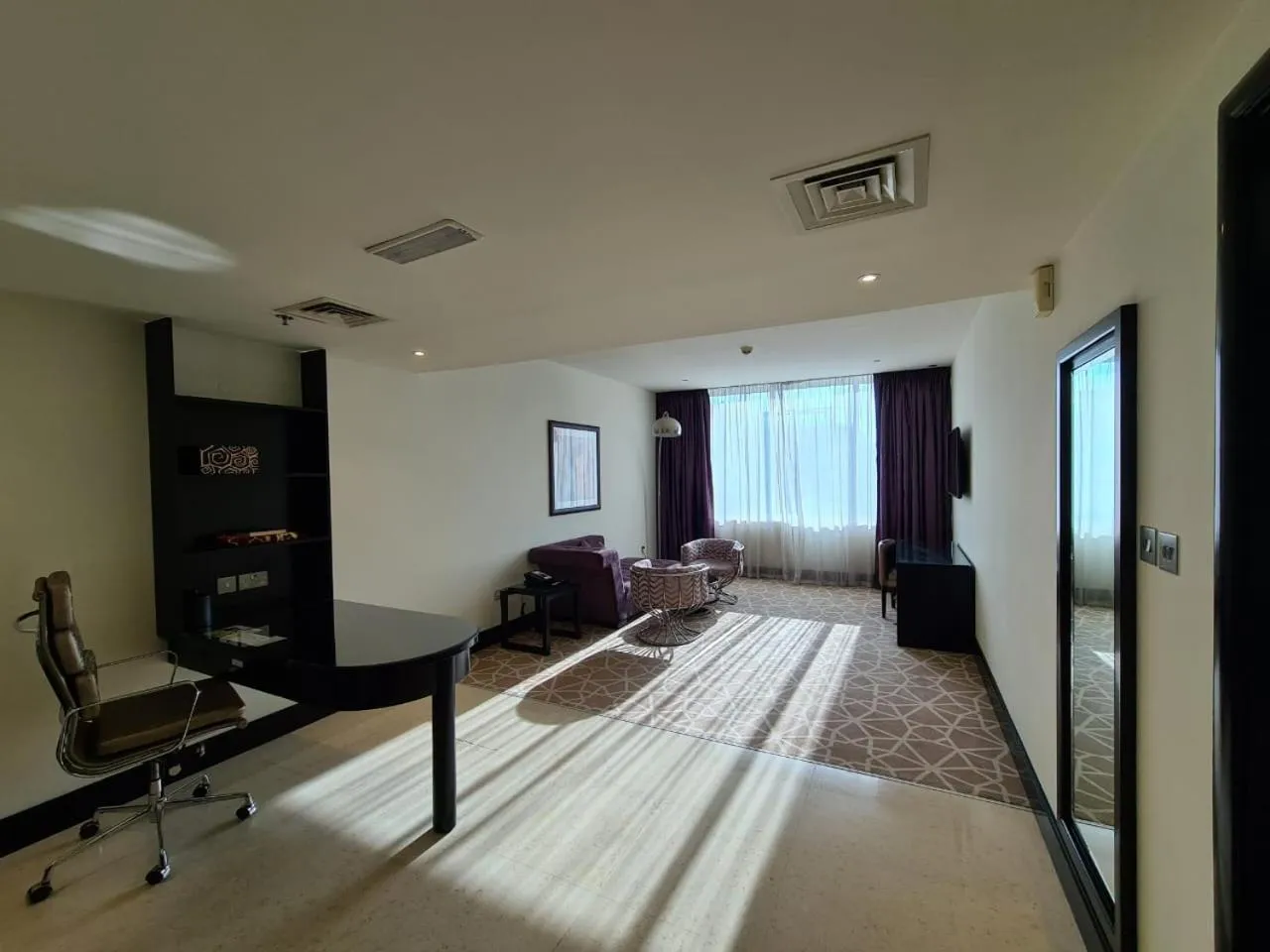Living room in Holiday Inn Dubai Al Barsha by IHG