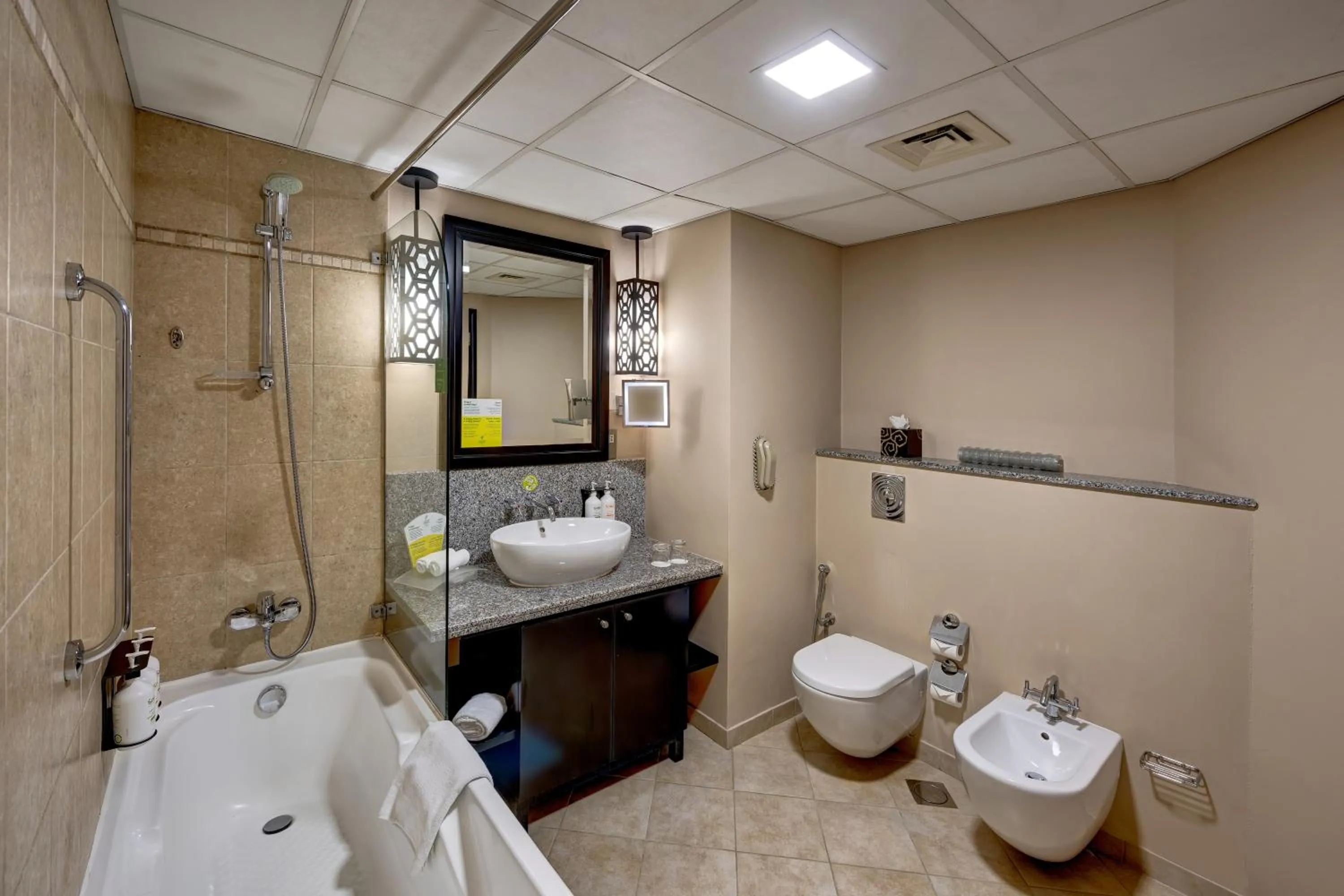 Bathroom in Holiday Inn Dubai Al Barsha by IHG