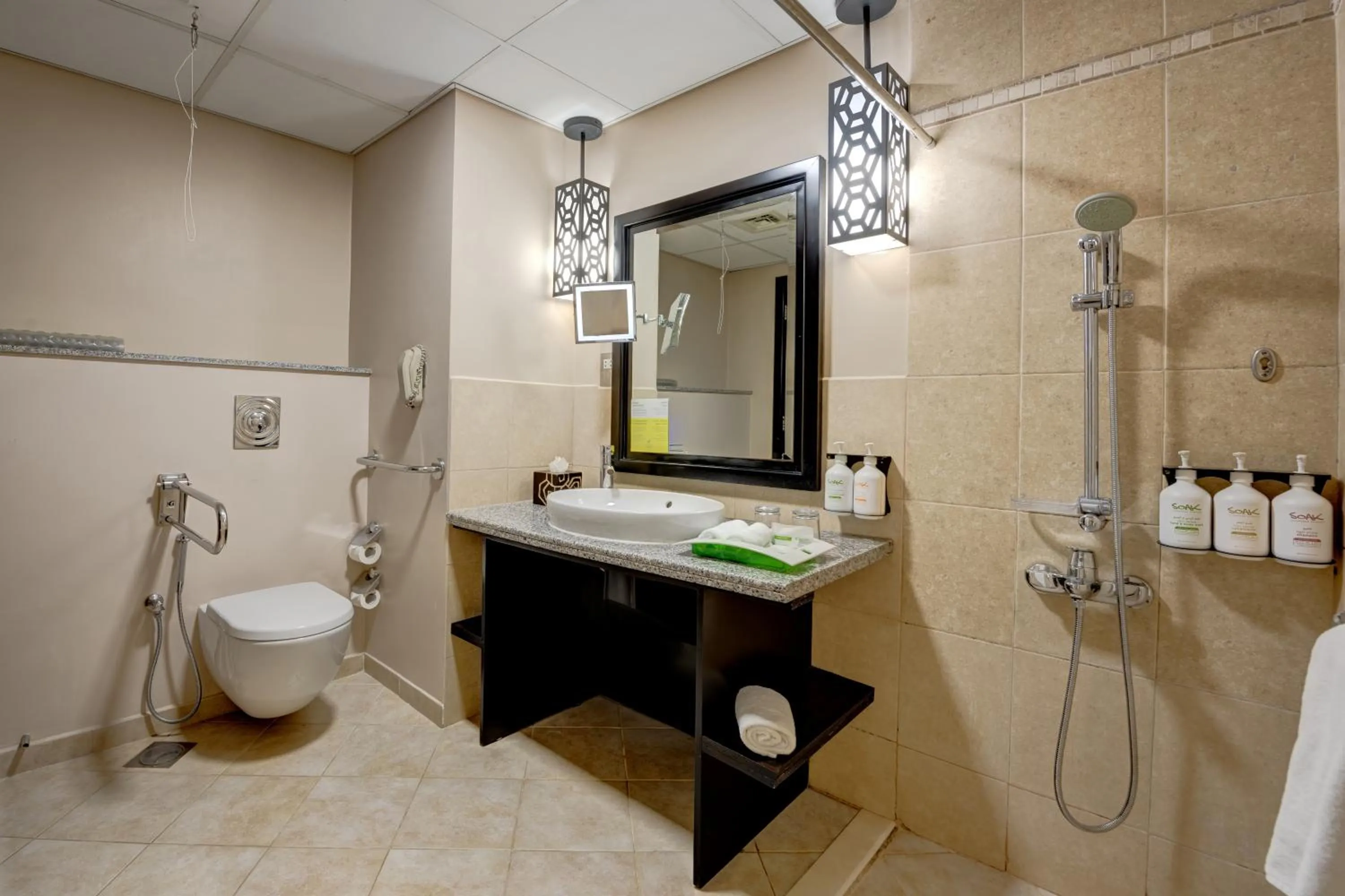 Bathroom in Holiday Inn Dubai Al Barsha by IHG