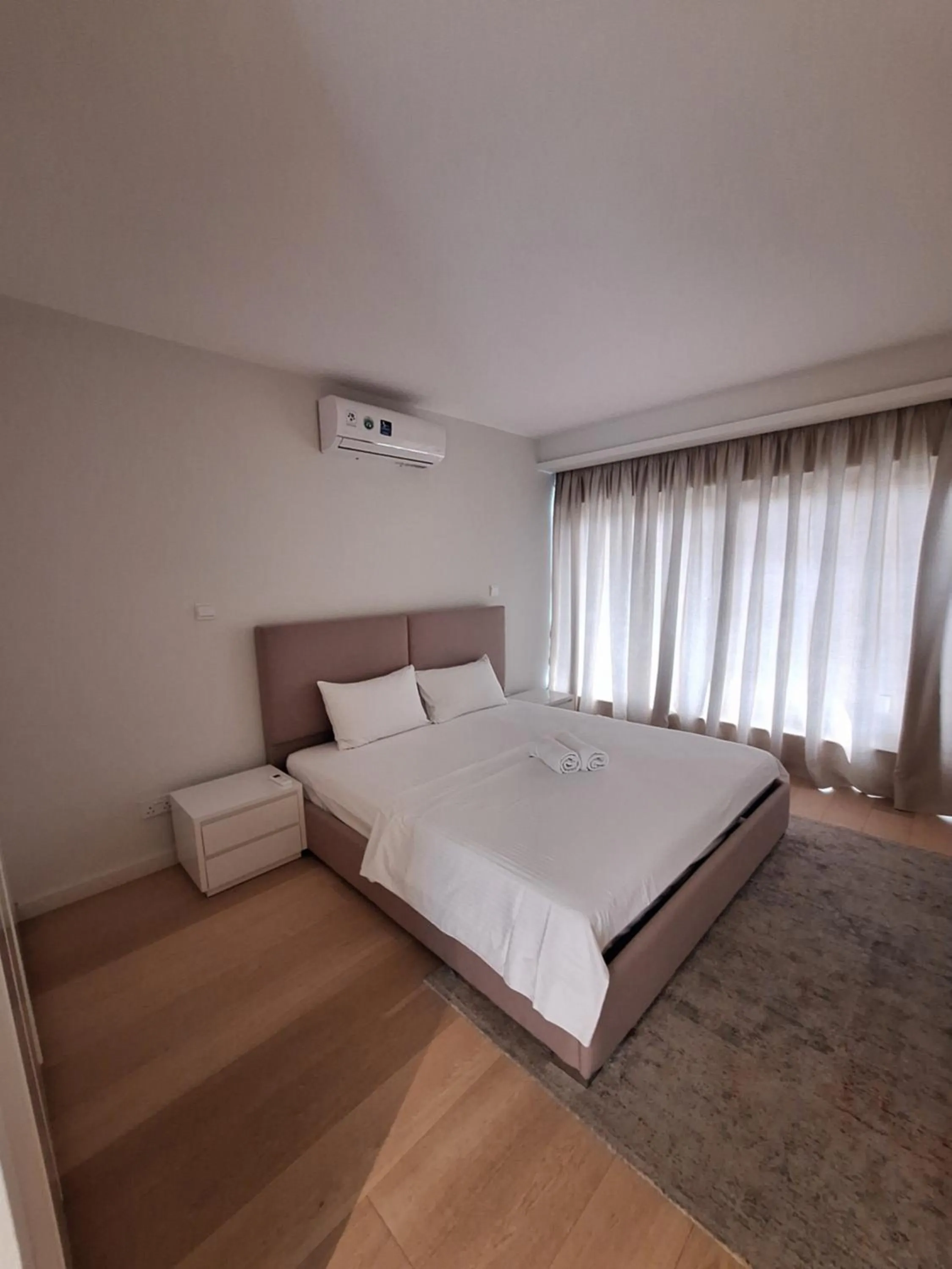 Bed in Emerald Suites