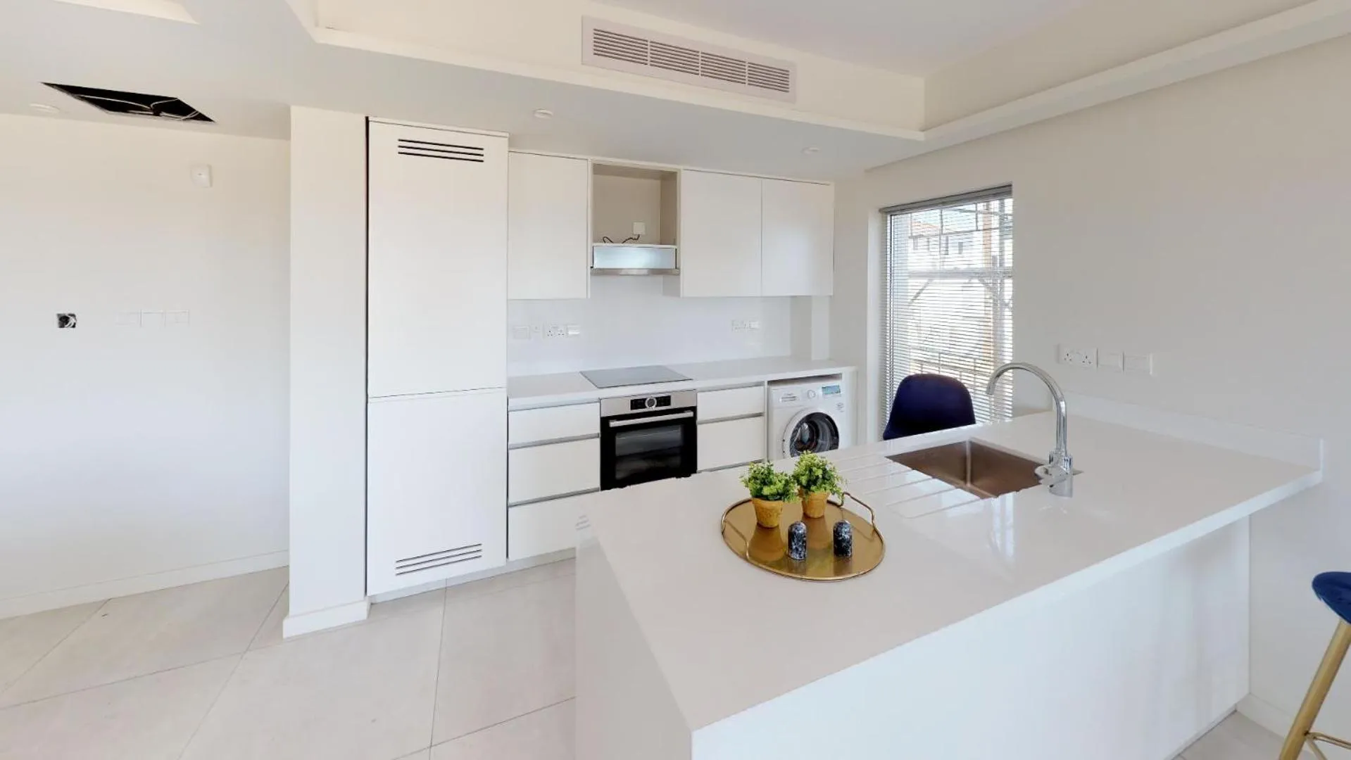 Communal kitchen in Emerald Suites