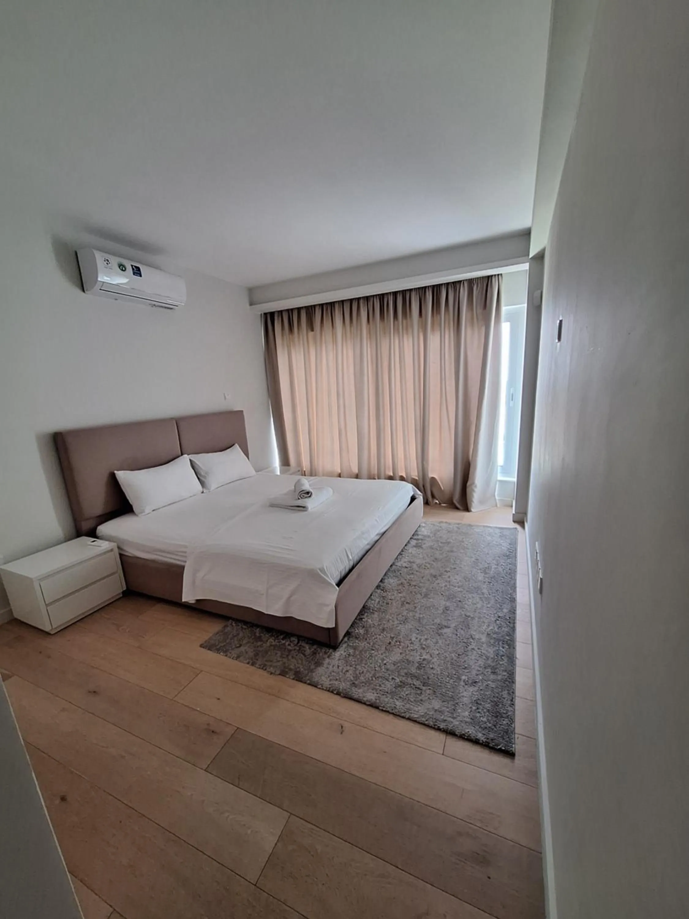 Bed in Emerald Suites