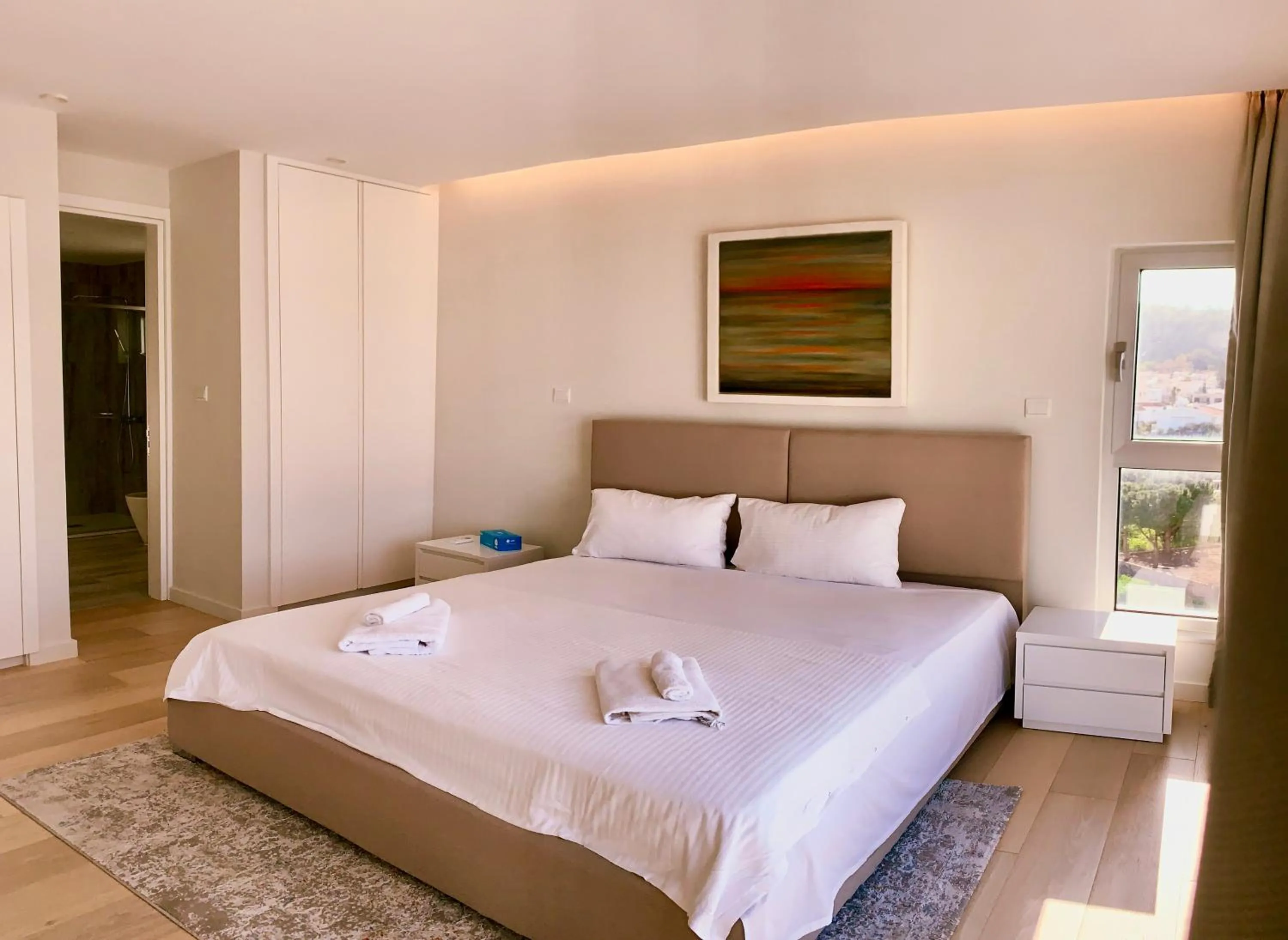 Bedroom, Bed in Emerald Suites