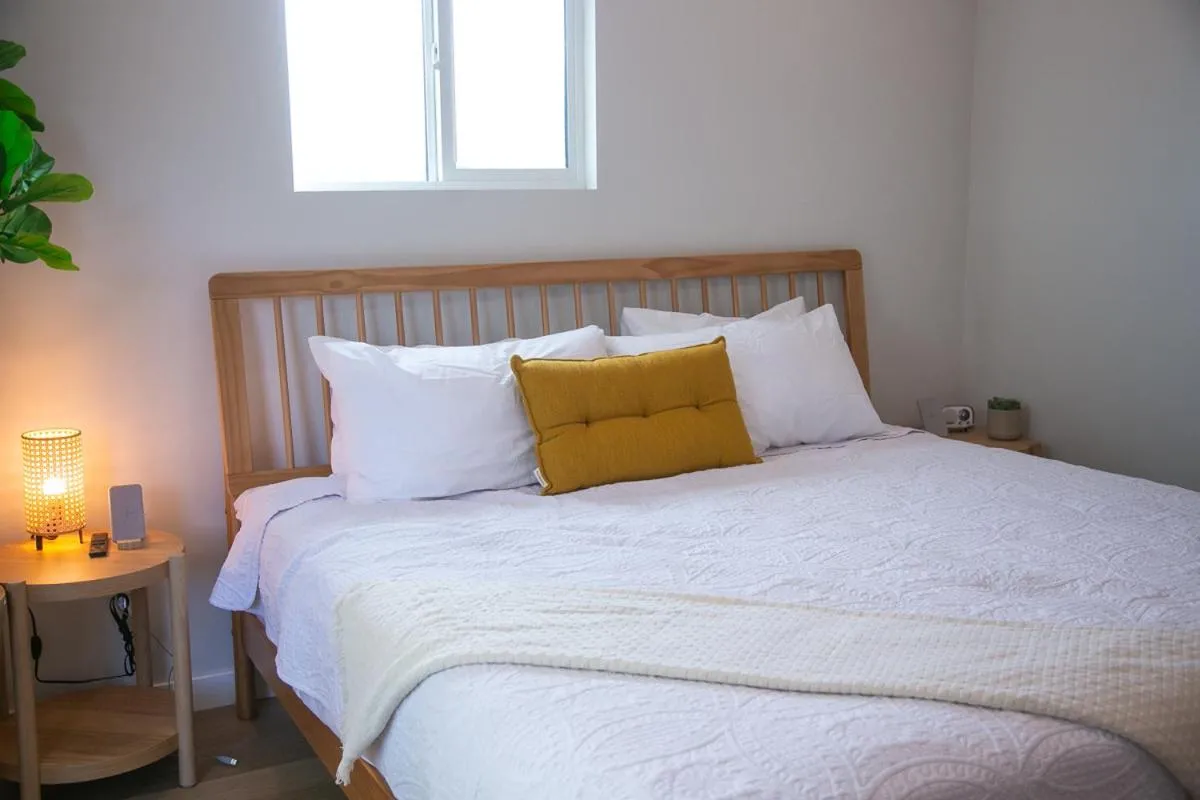 Bed in The Good House- Hot Spring Hideaway
