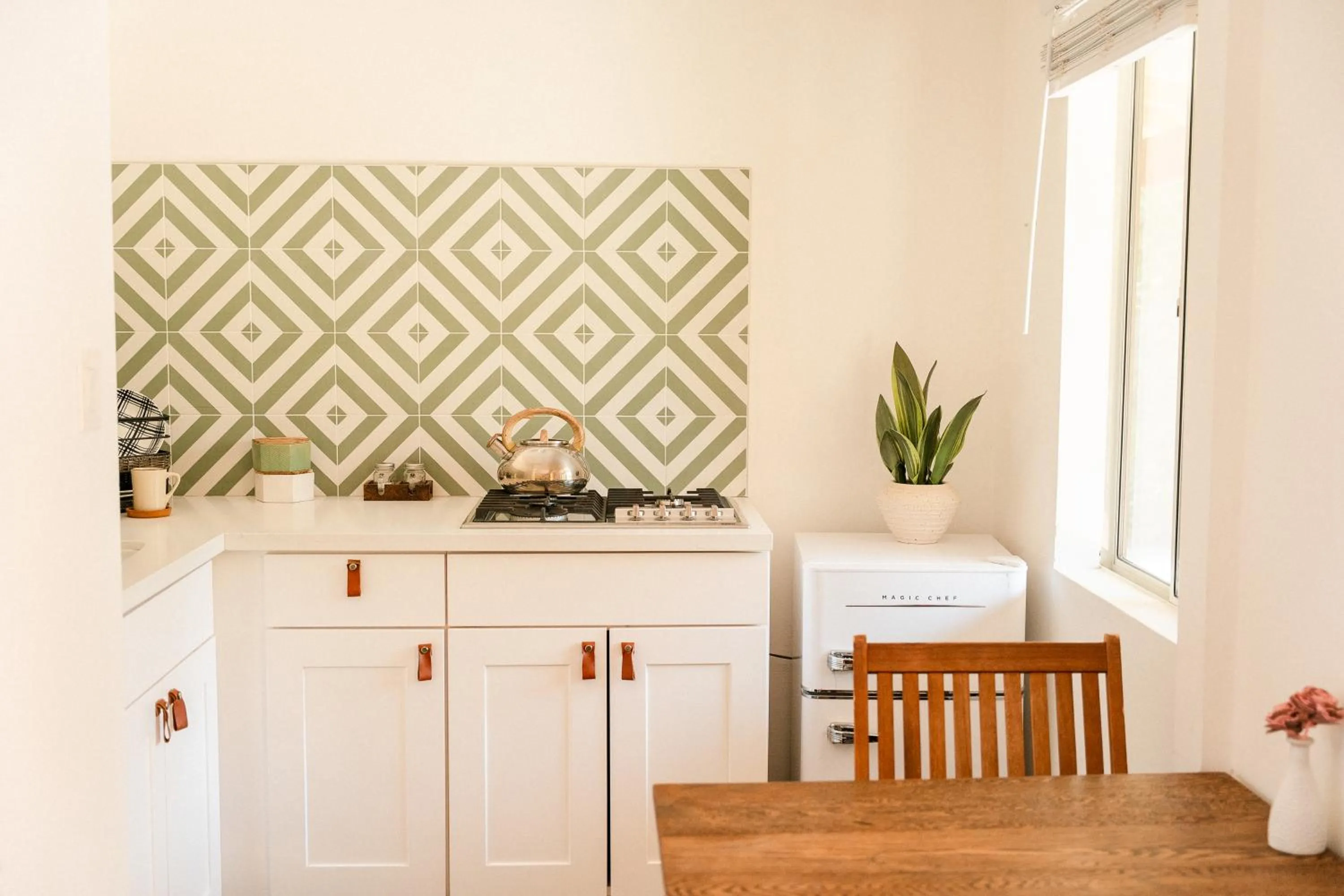 Kitchen or kitchenette in The Good House- Hot Spring Hideaway