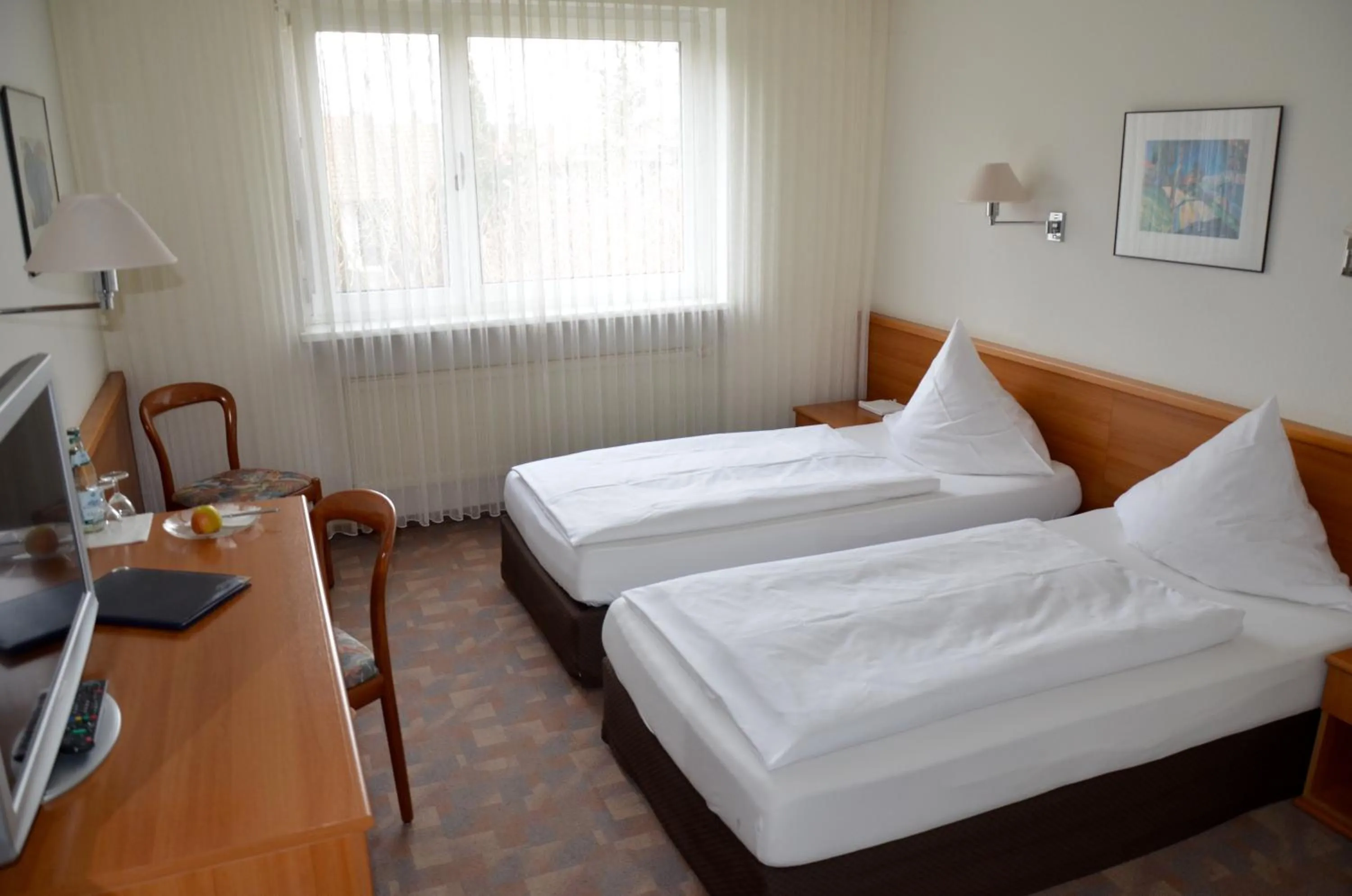 Photo of the whole room, Bed in Hotel Höllsteiner Hof