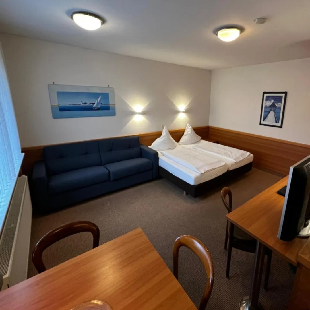 Bed in Hotel Höllsteiner Hof