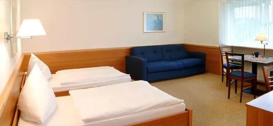 Photo of the whole room, Bed in Hotel Höllsteiner Hof