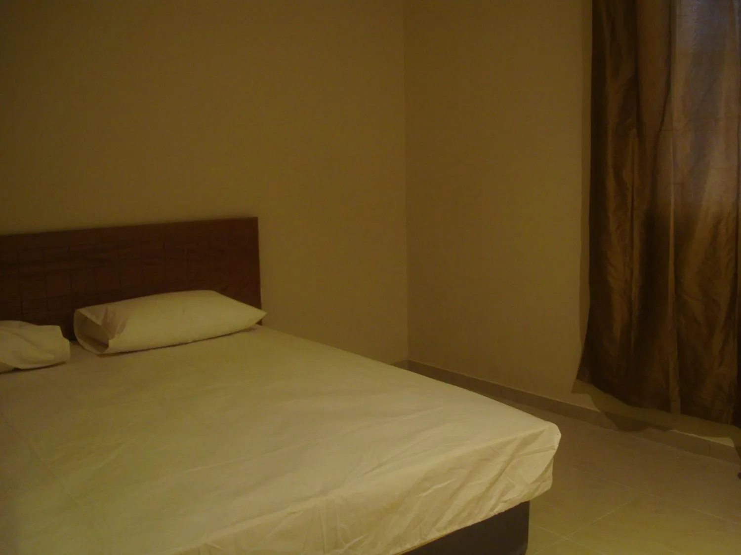 Bed in Red Tower Furnished Apartments