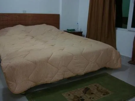 Bedroom, Bed in Red Tower Furnished Apartments