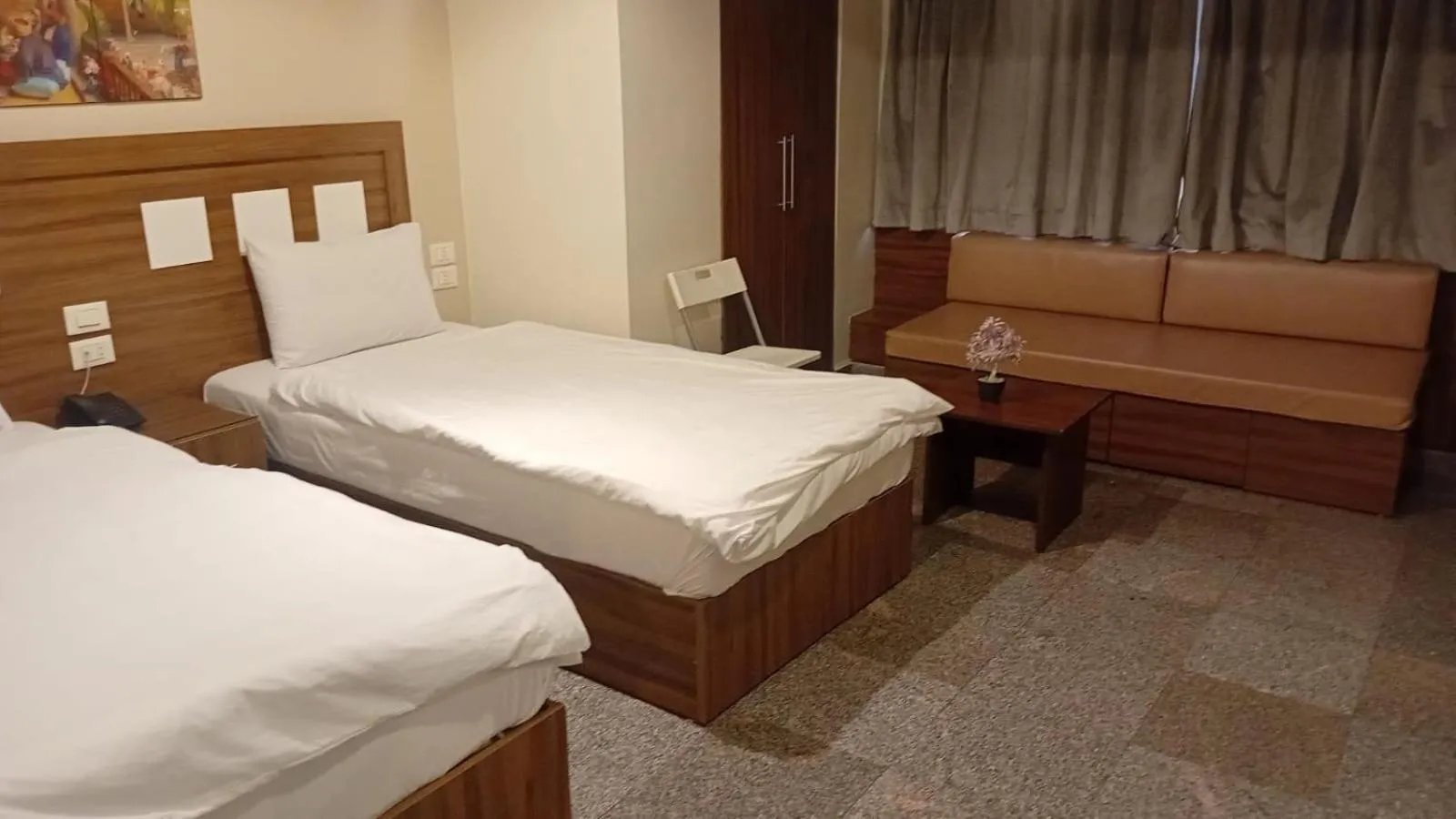 Bed in Royal Inn Residence