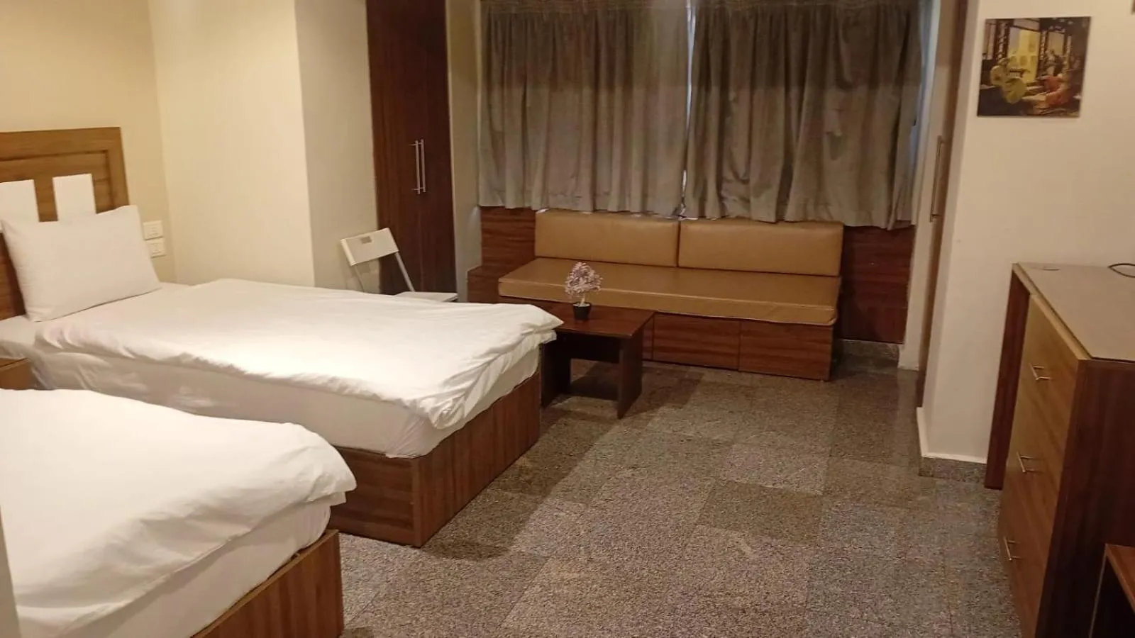 Bed in Royal Inn Residence