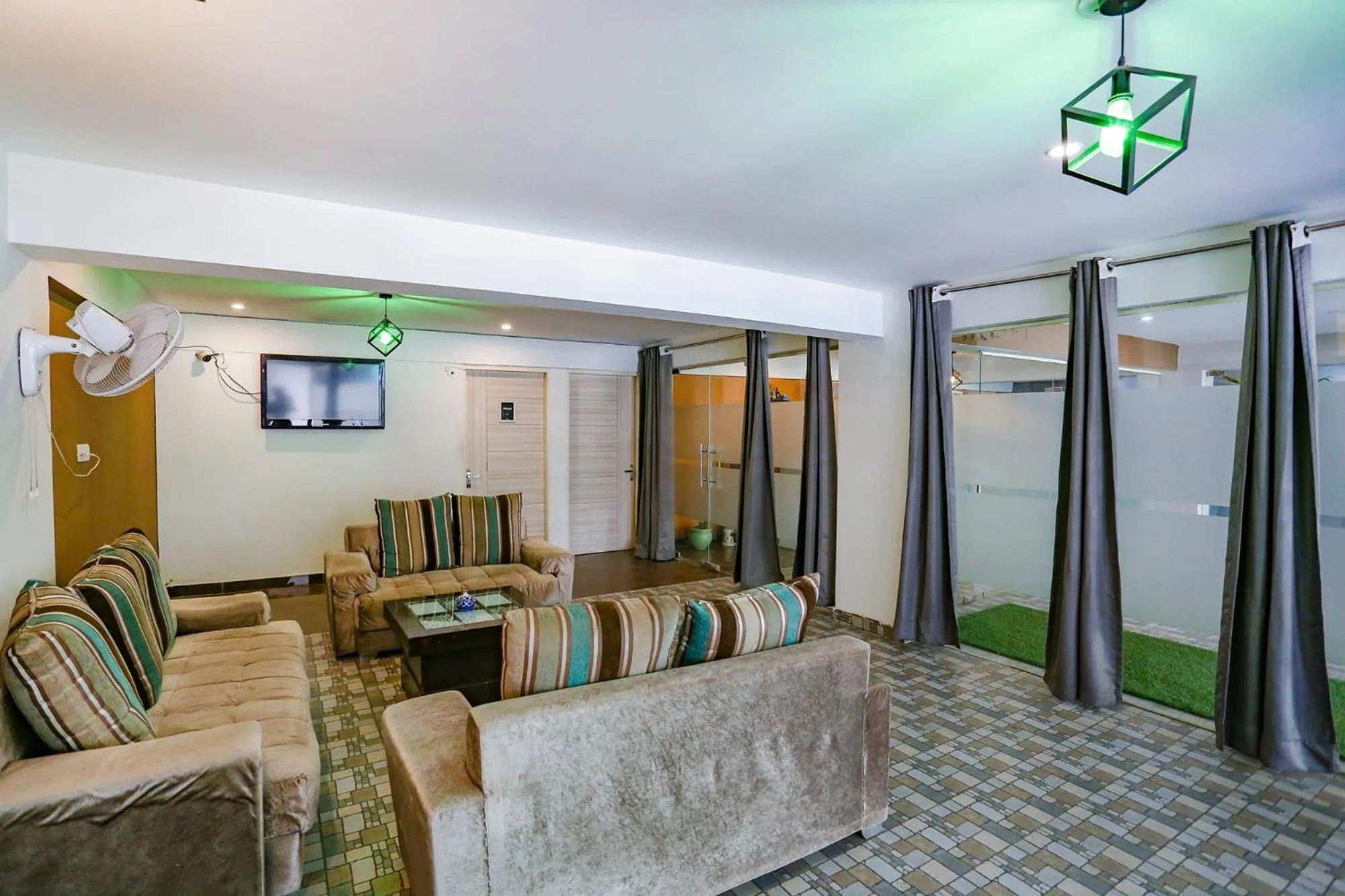 TV and multimedia in FabHotel Sky Rise Inn Near Medanta- The Medicity Hospital, Gurugram