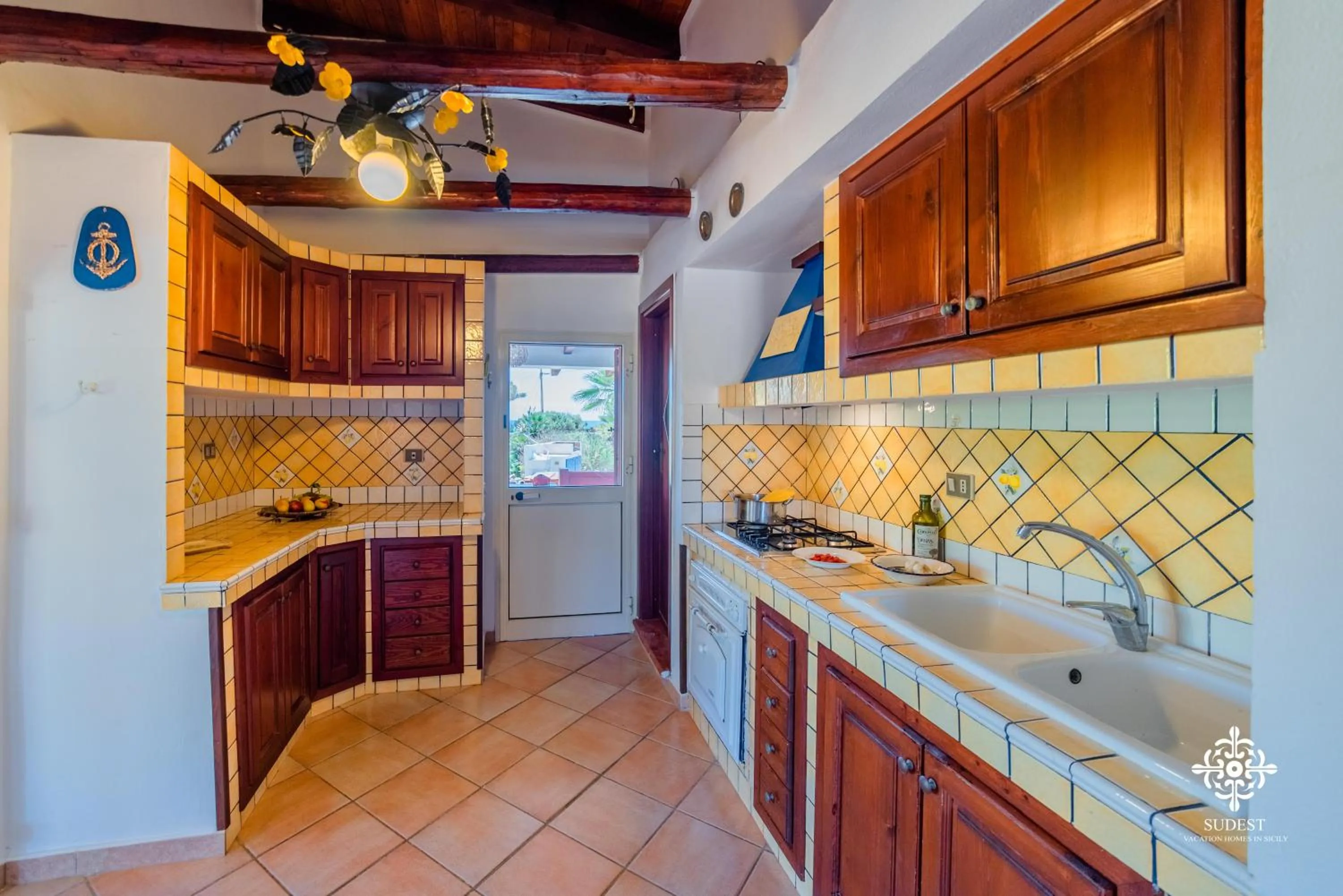 Kitchen or kitchenette in Residenza Ormos - Dimore sul mare
