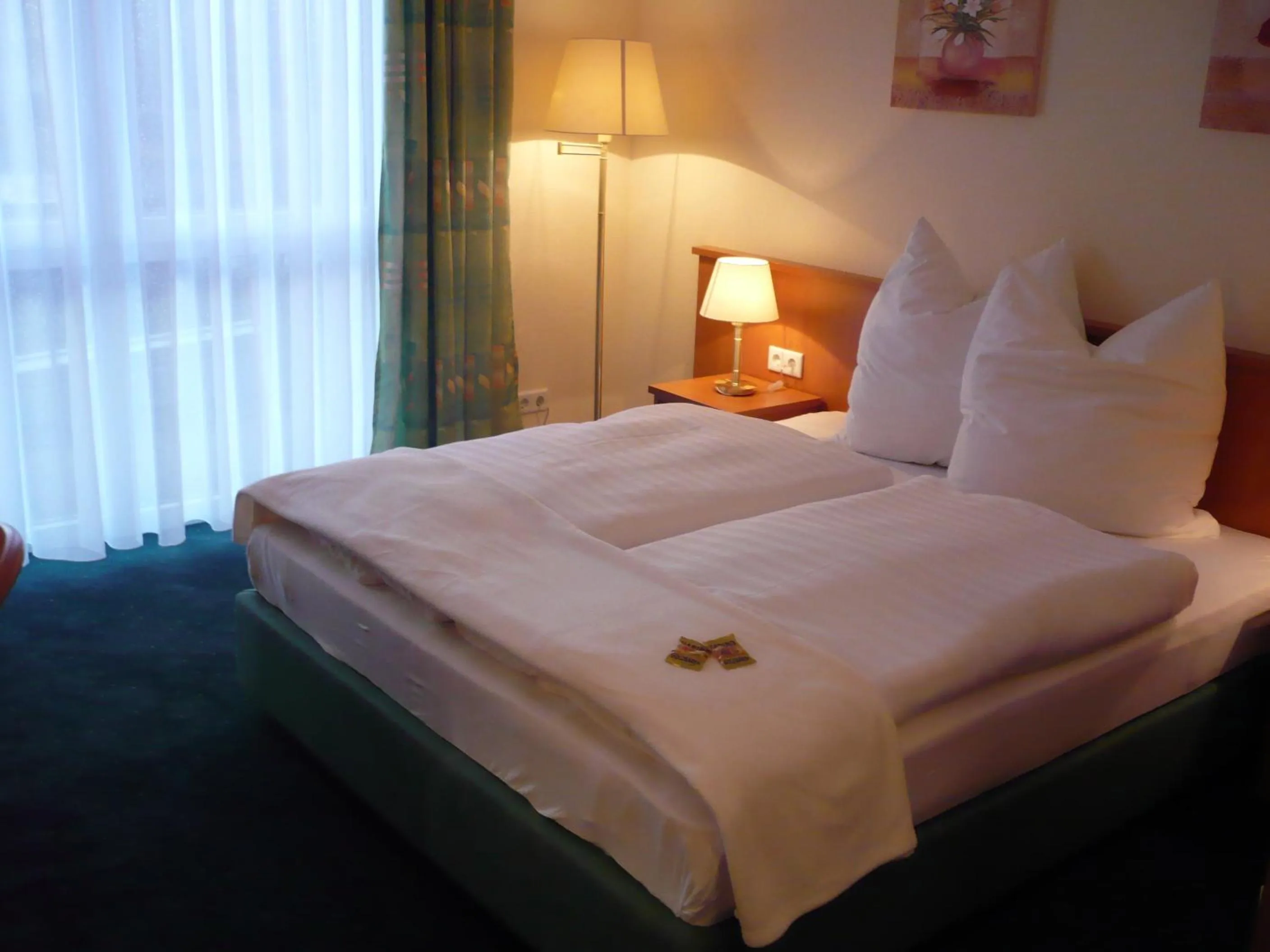 Bed in Frick's Hotel