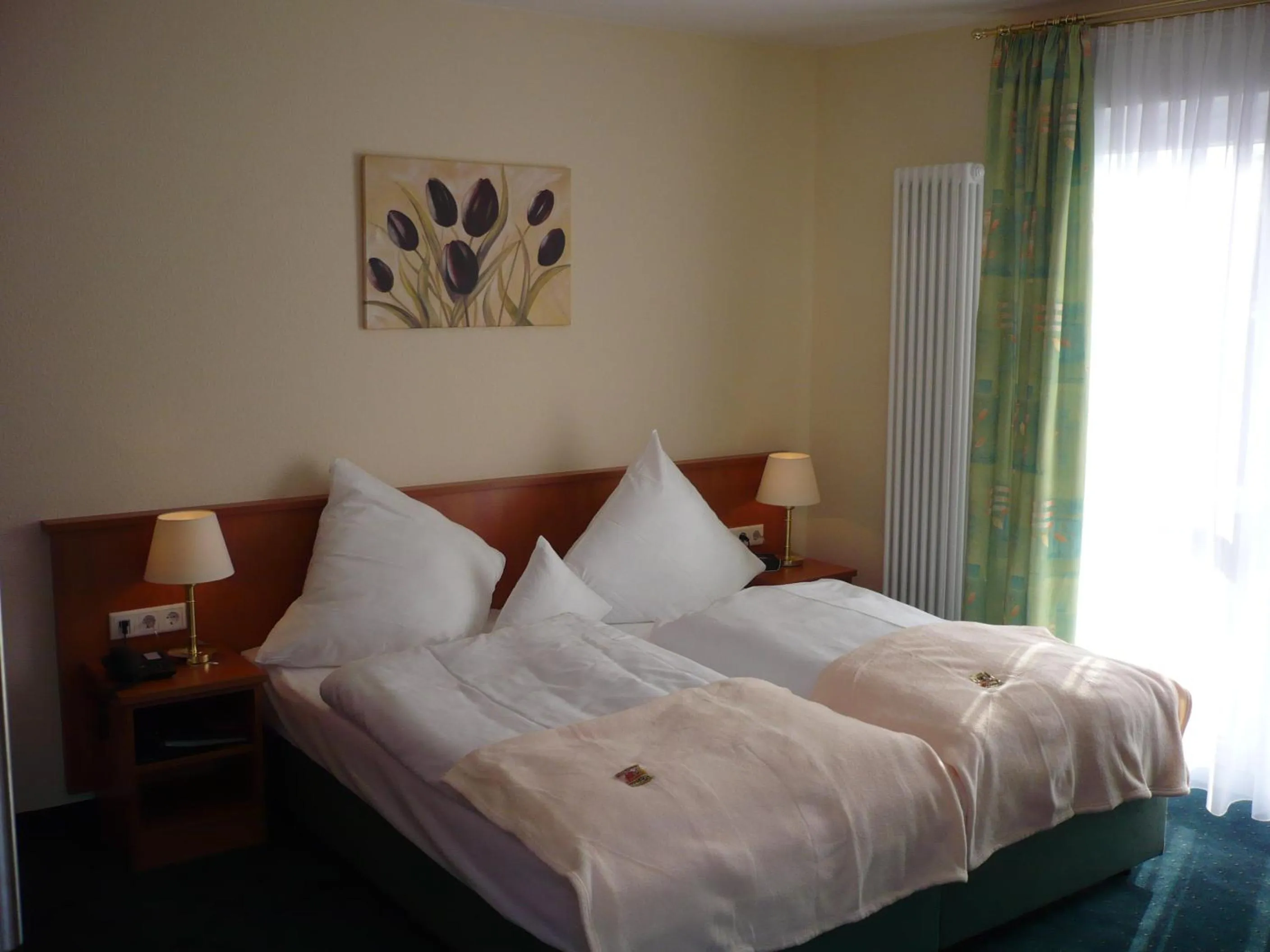 Bed in Frick's Hotel