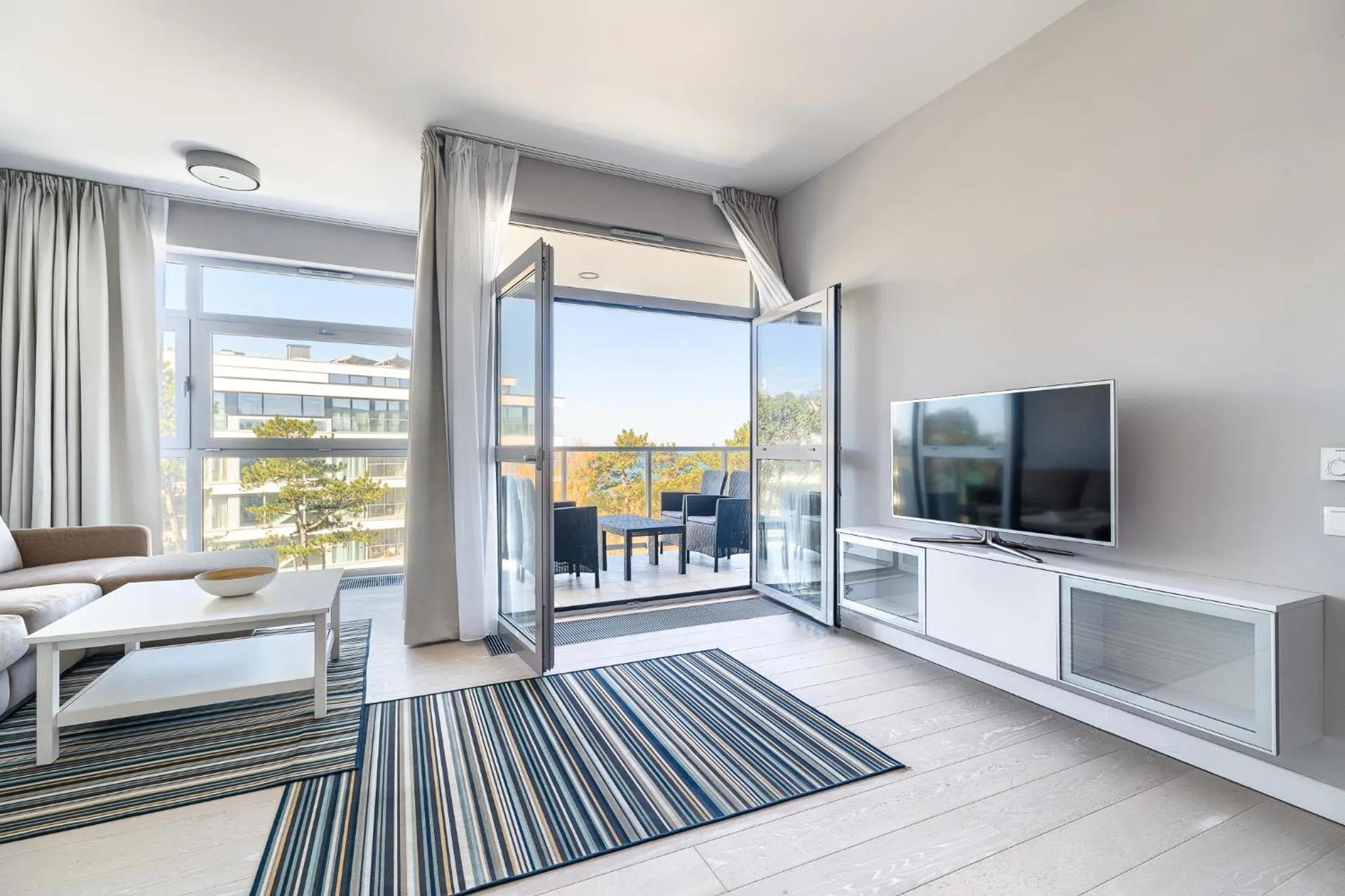 Communal lounge/ TV room in Dune Resort Mielno - A