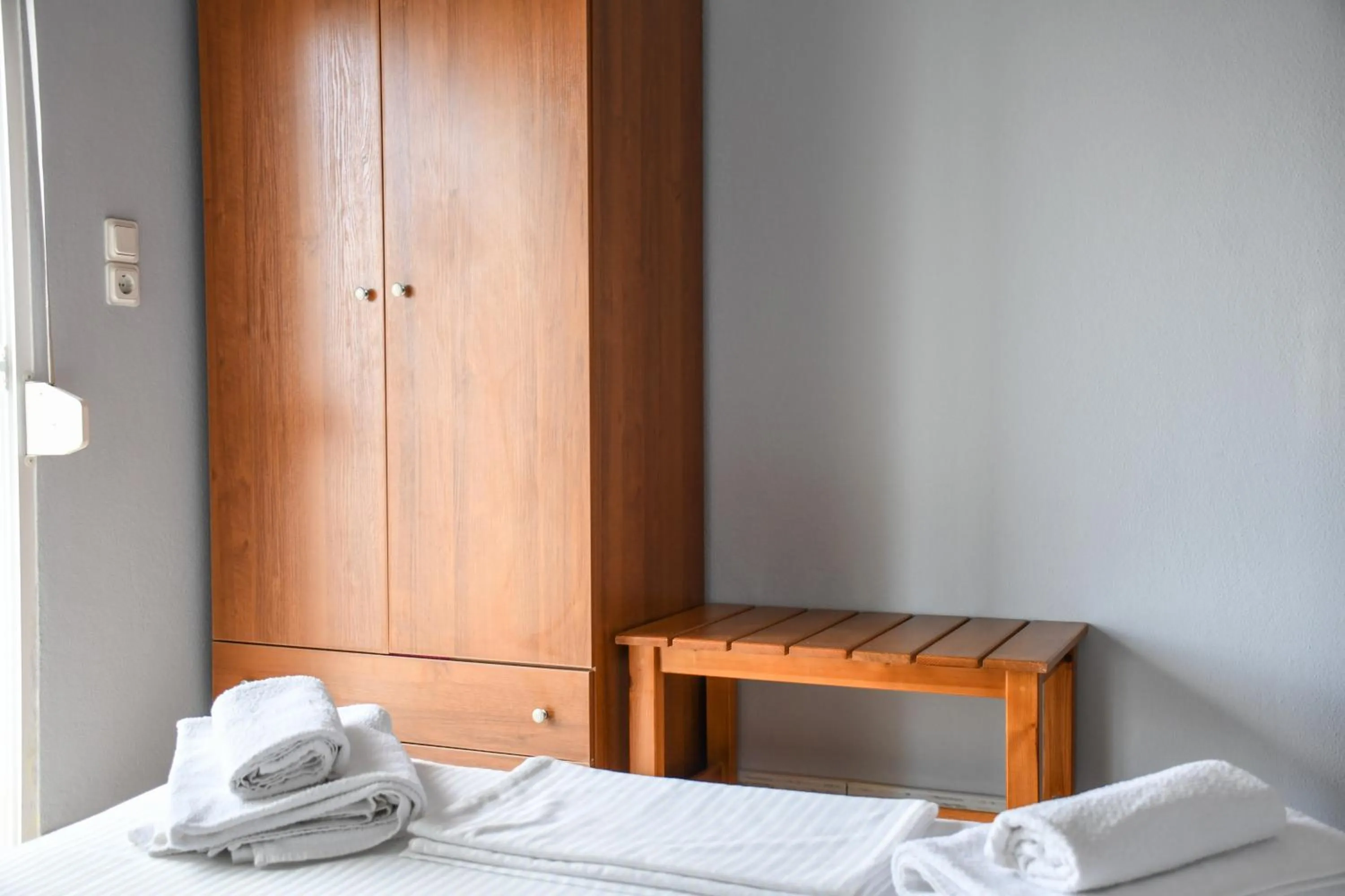 Bed in Artemis Hotel Apartments