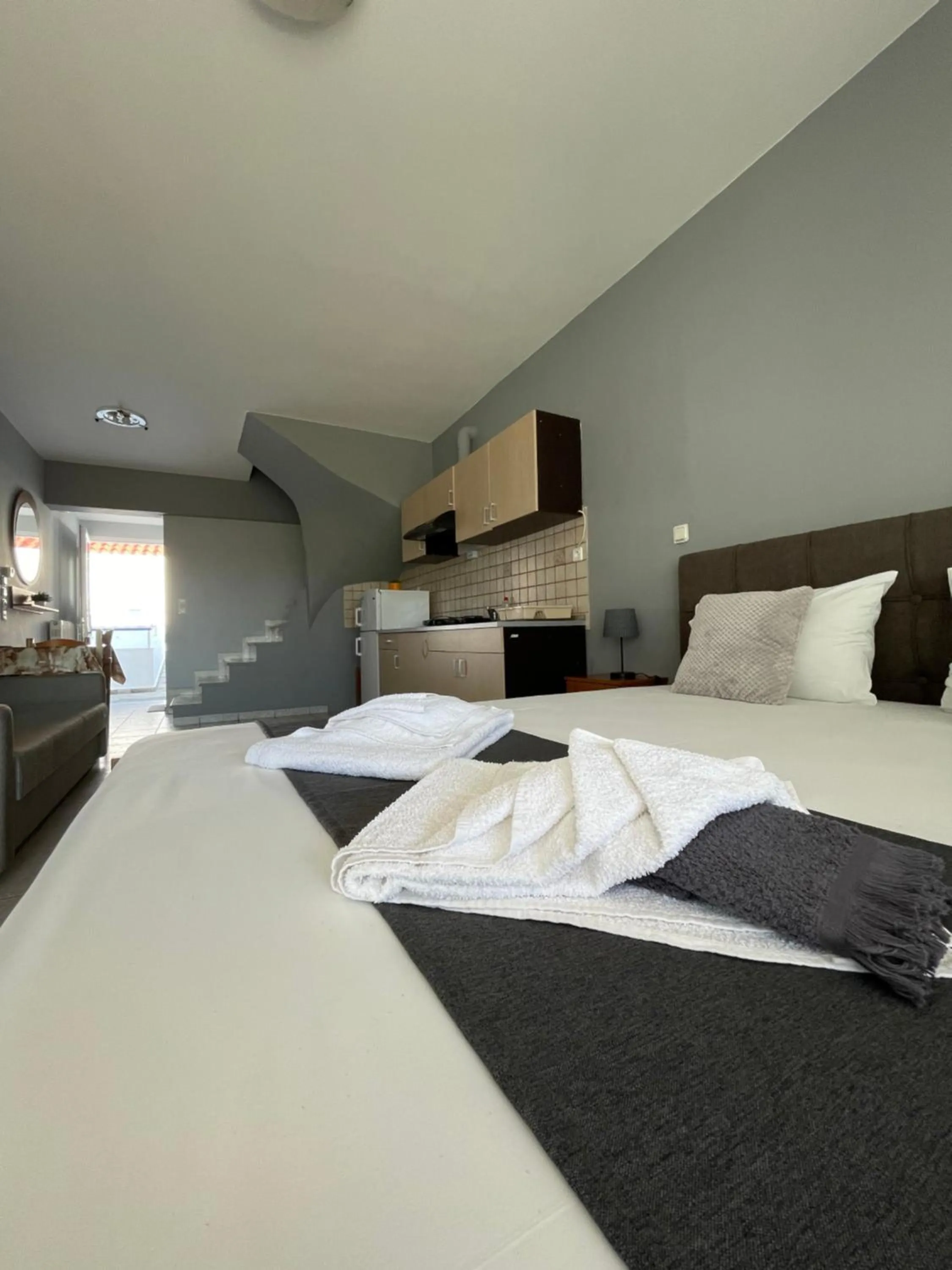 Bed in Artemis Hotel Apartments