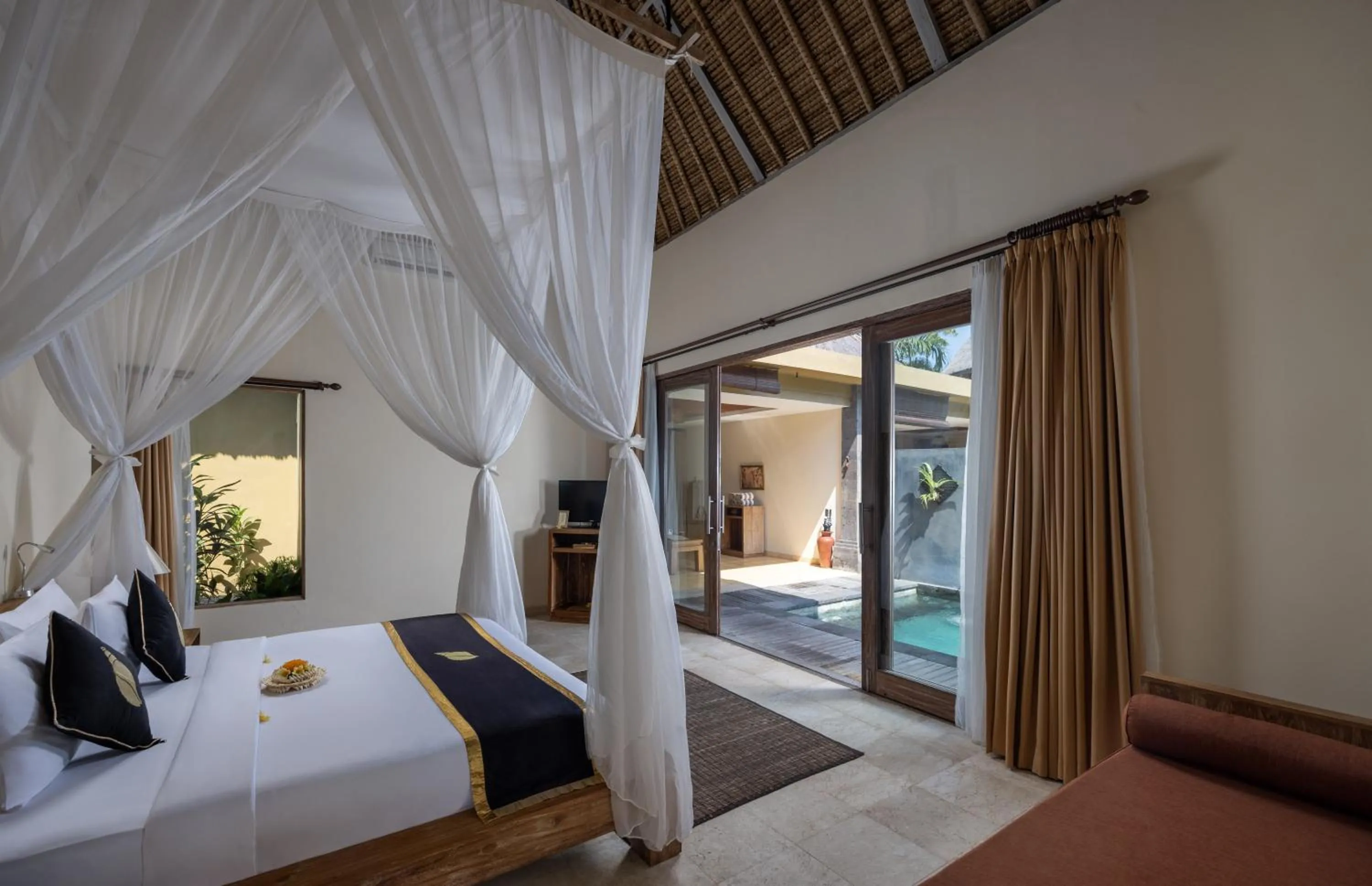 Bed in The Sankara Resort & Spa