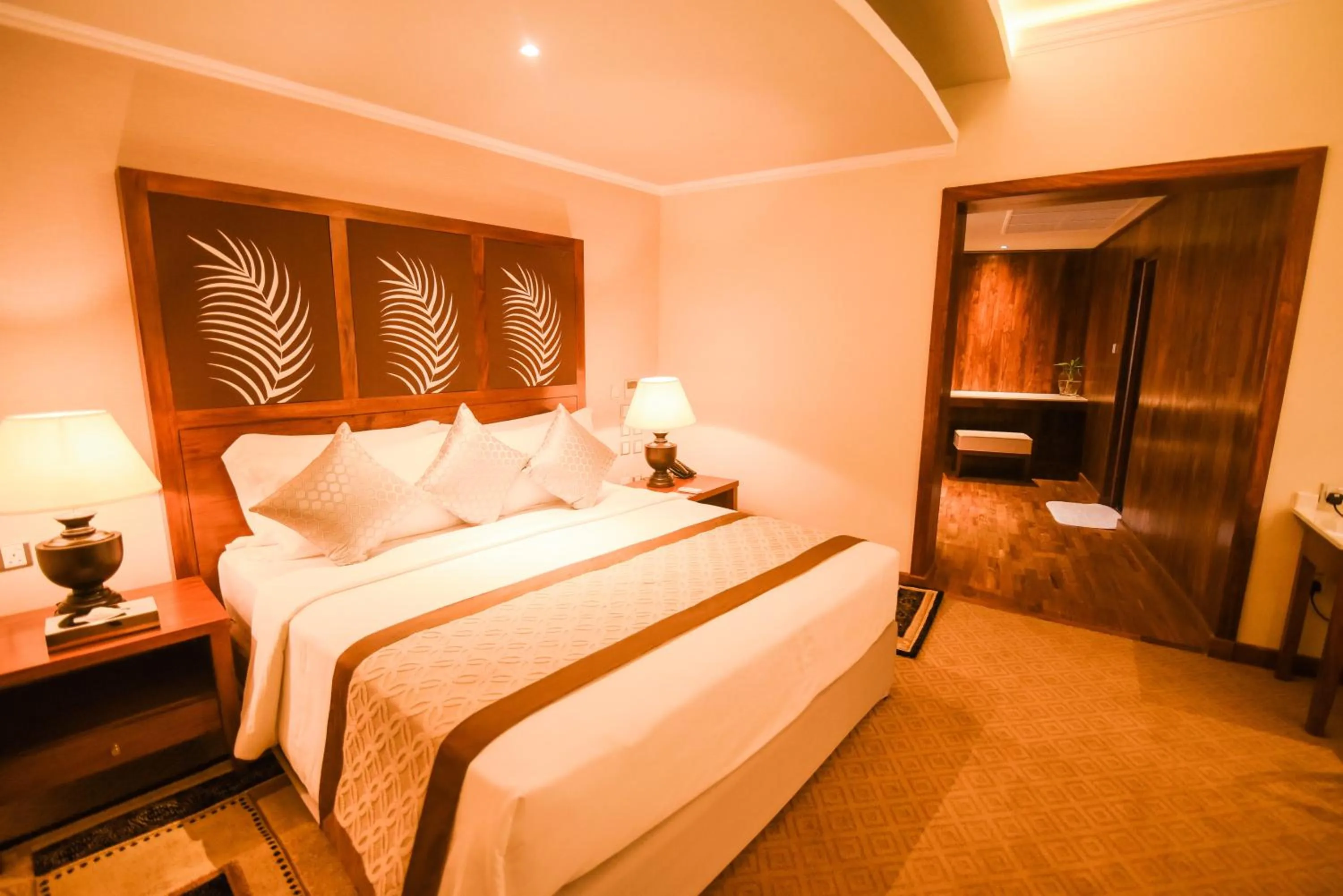 Bed in Earl's Regent Hotel