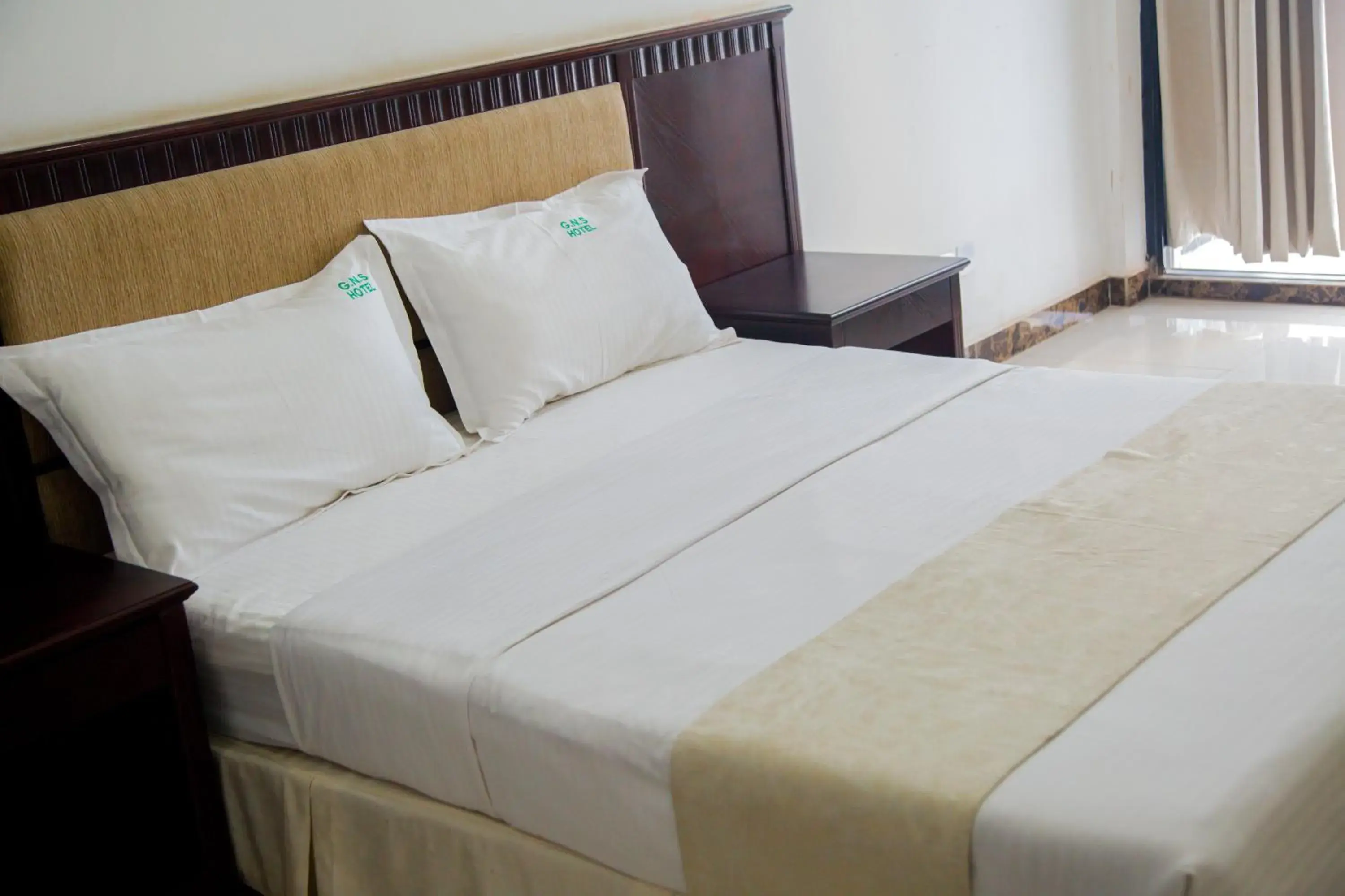 Budget Double Room - single occupancy in GNS Hotel Kampala Budget Double Room - single occupancy in GNS Hotel Kampala