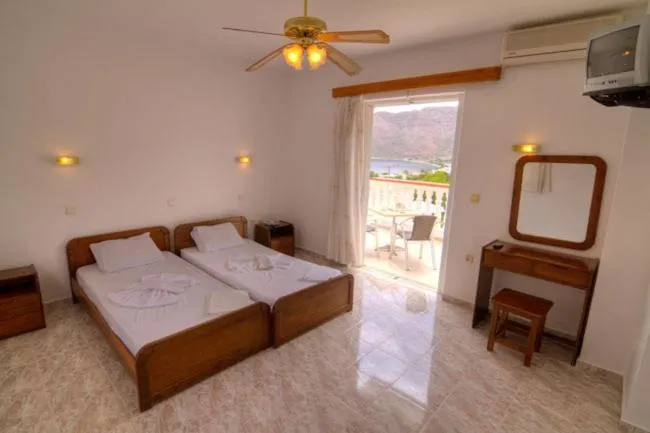 Photo of the whole room, Bed in Seva' s Studios
