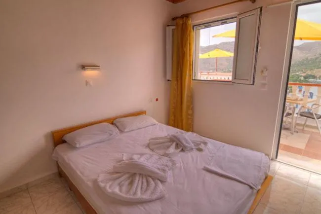 Photo of the whole room, Bed in Seva' s Studios