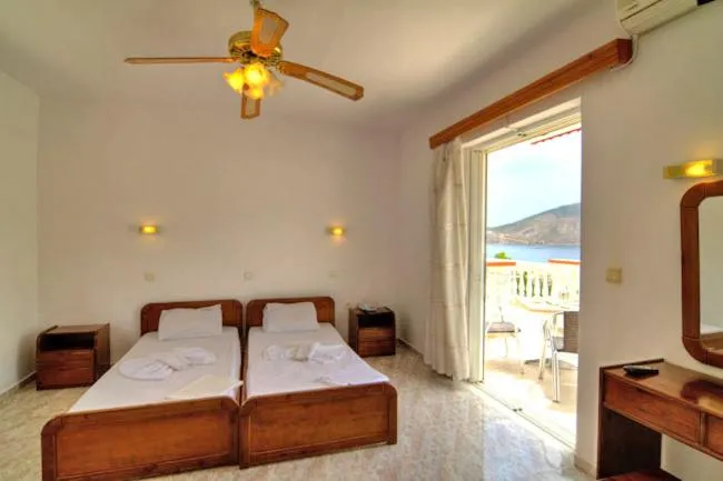 Photo of the whole room, Bed in Seva' s Studios