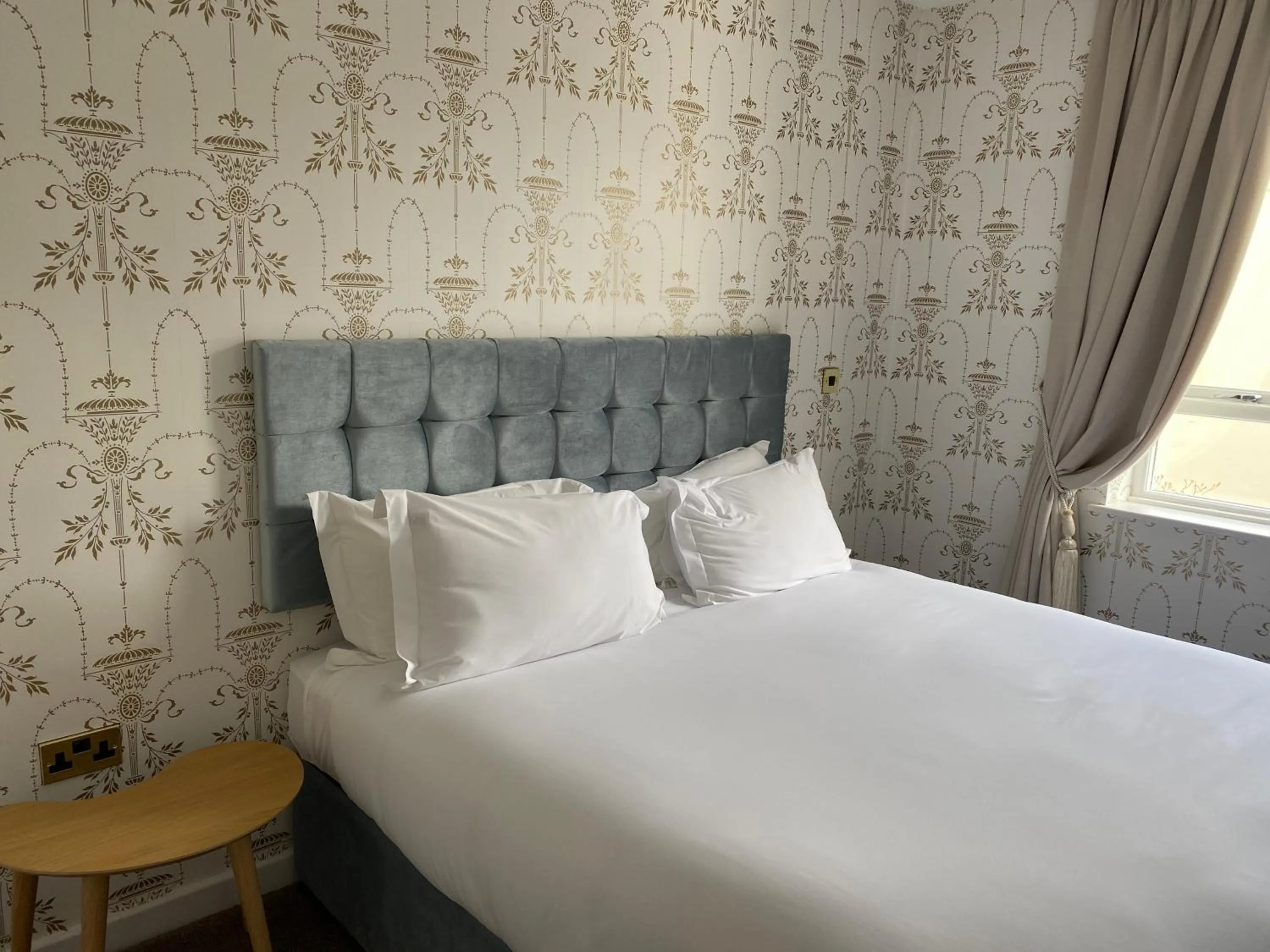 Bed in RainHill Hall Hotel