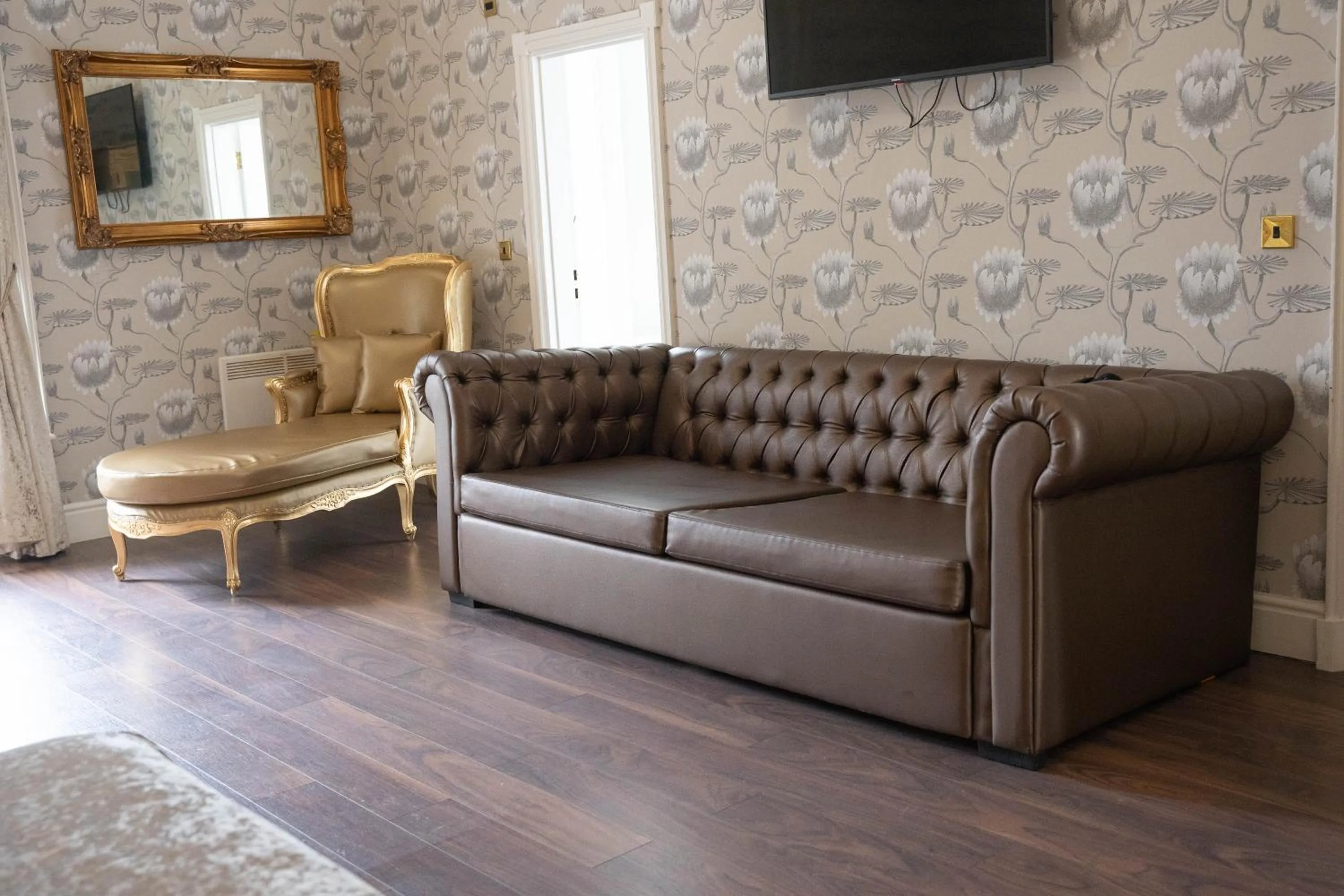 Seating area in RainHill Hall Hotel