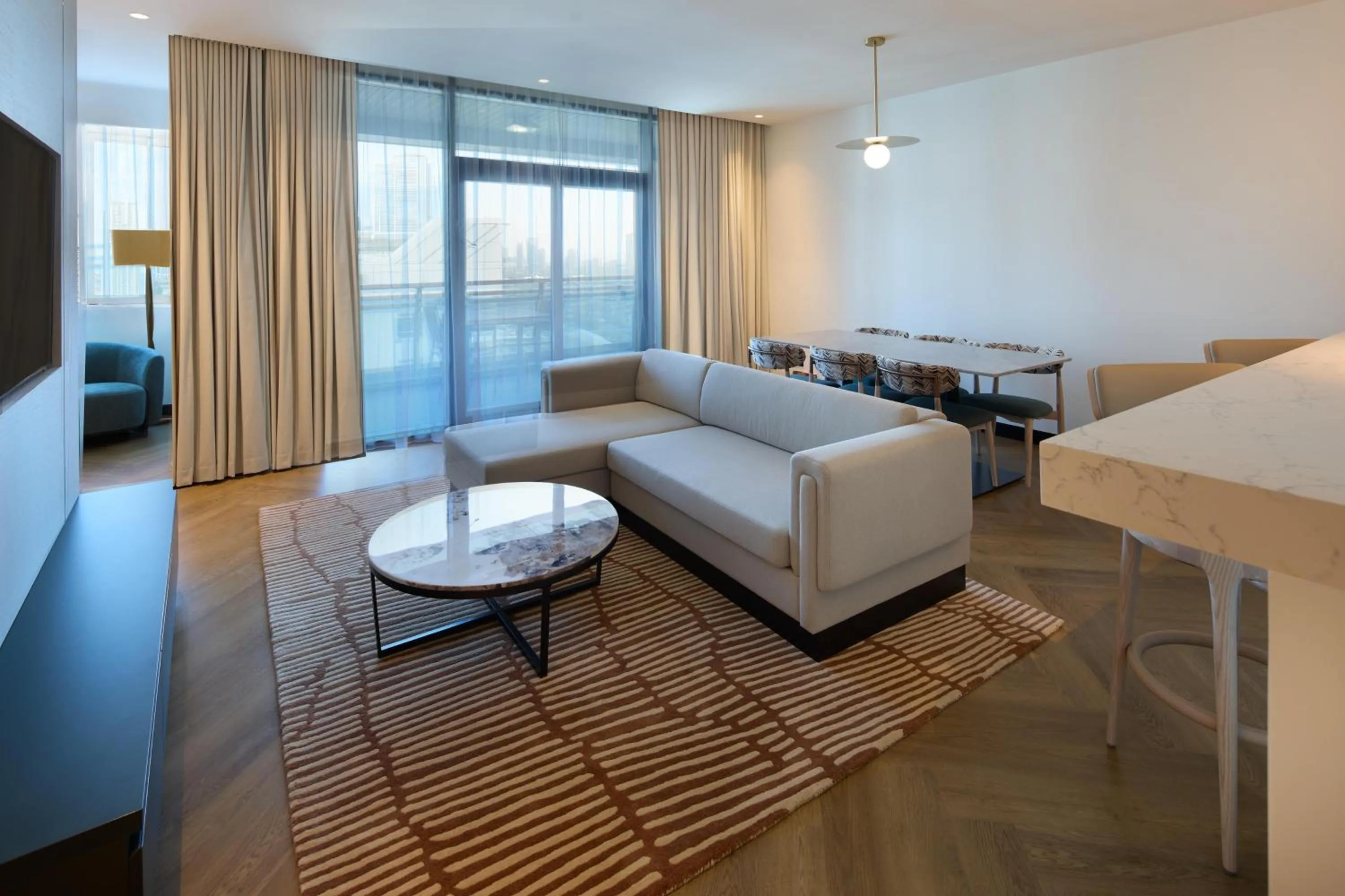 Living room, Bed in Radisson Blu Residence, Dubai Marina