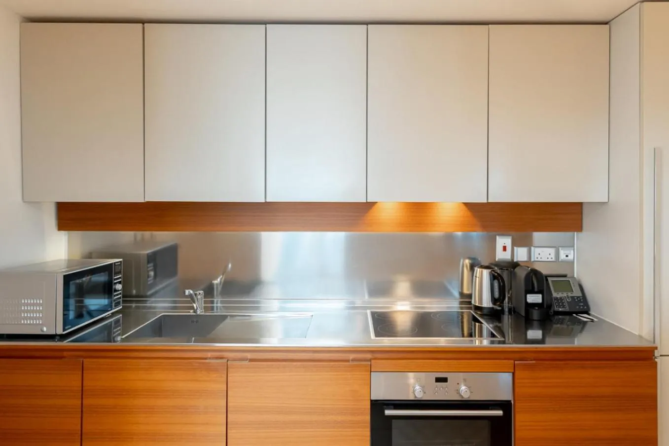 Kitchen or kitchenette in Radisson Blu Residence, Dubai Marina