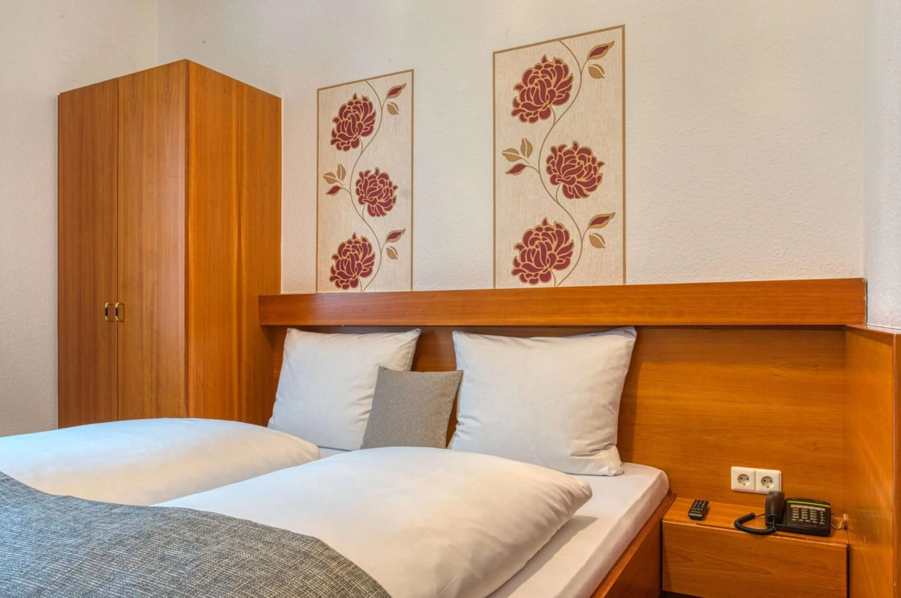 Photo of the whole room, Bed in Sautter Hotel Stuttgart City