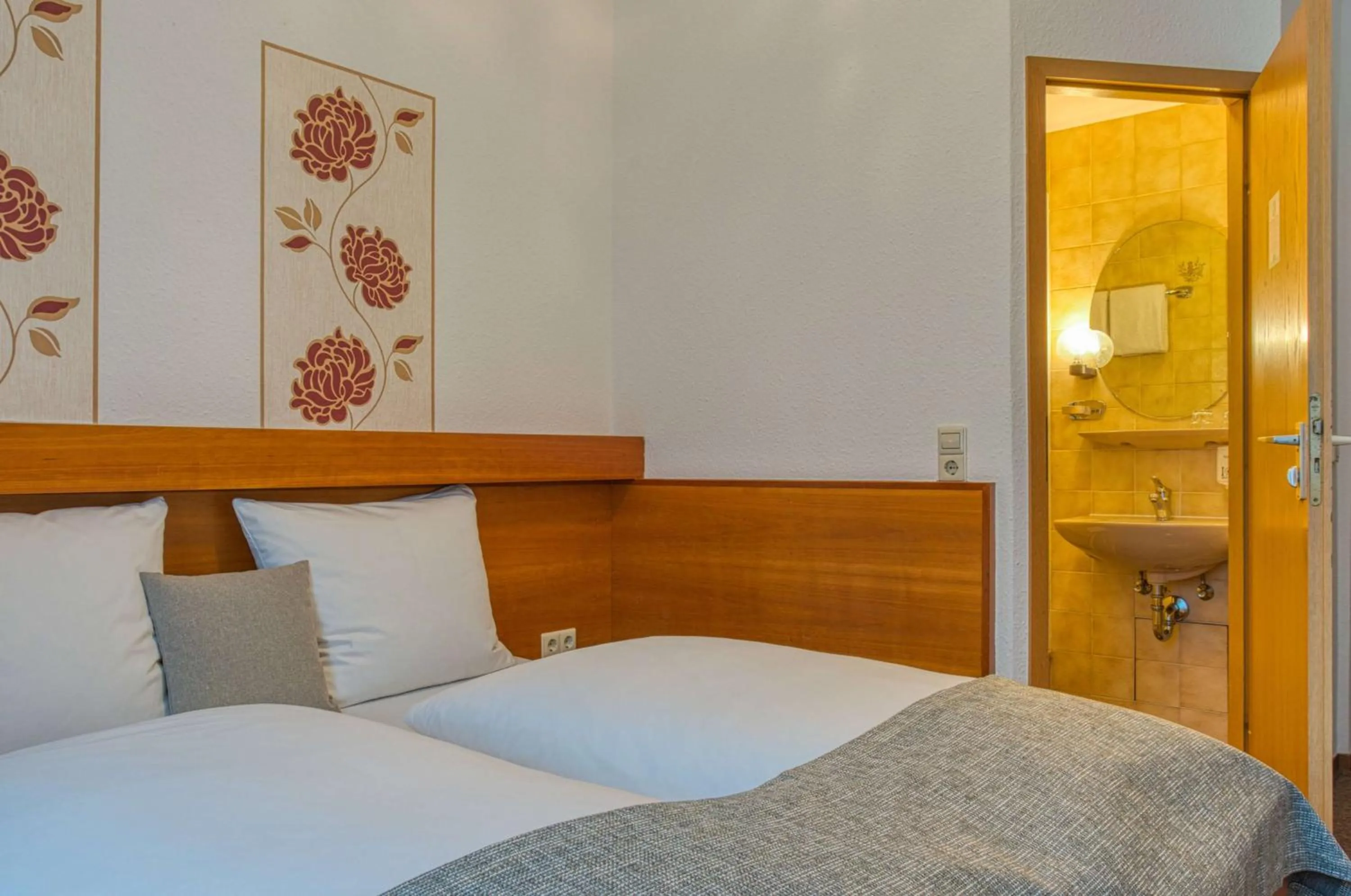 Photo of the whole room, Bed in Sautter Hotel Stuttgart City