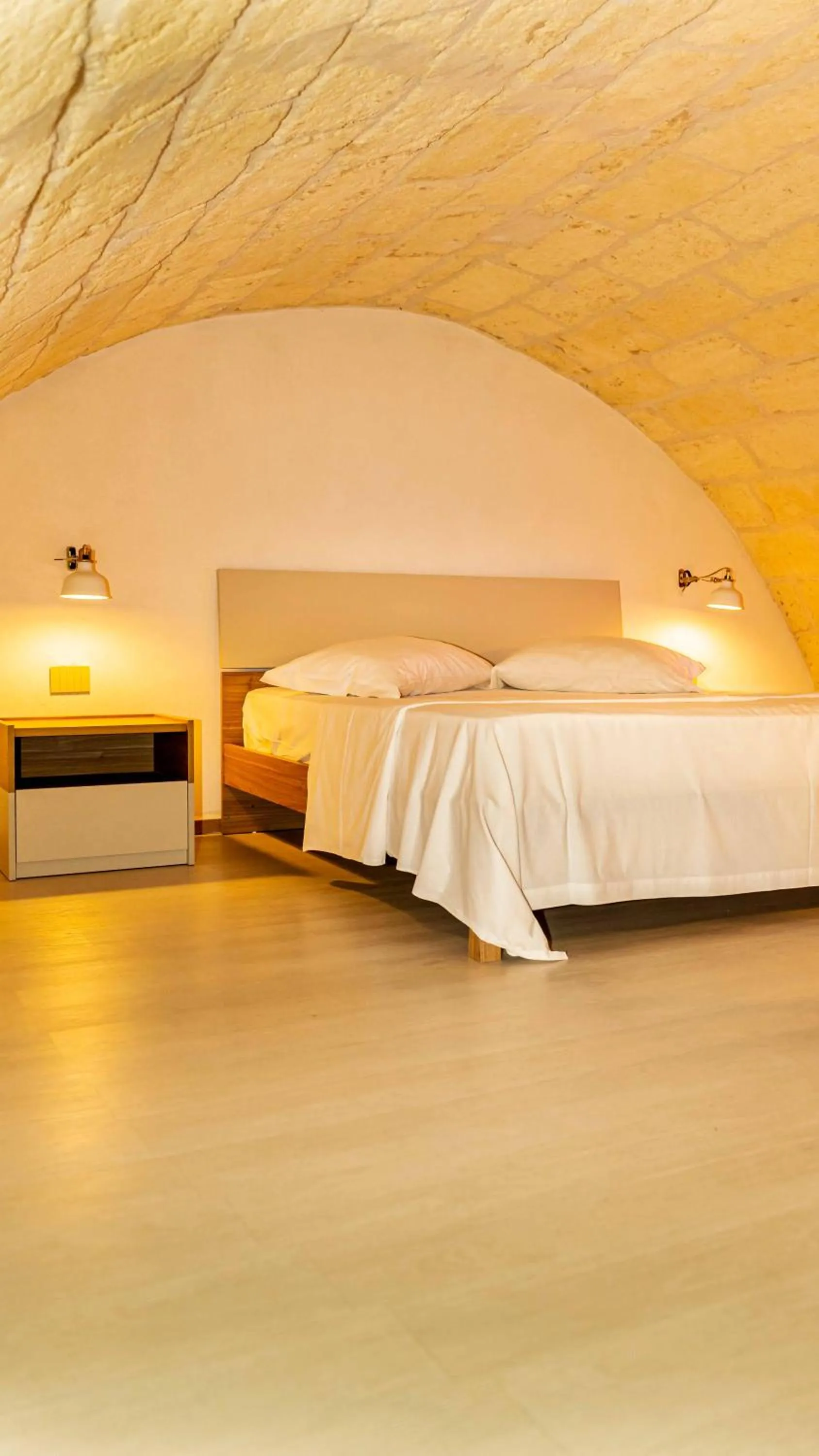 Bed in Il Melograno - Suite Deluxe