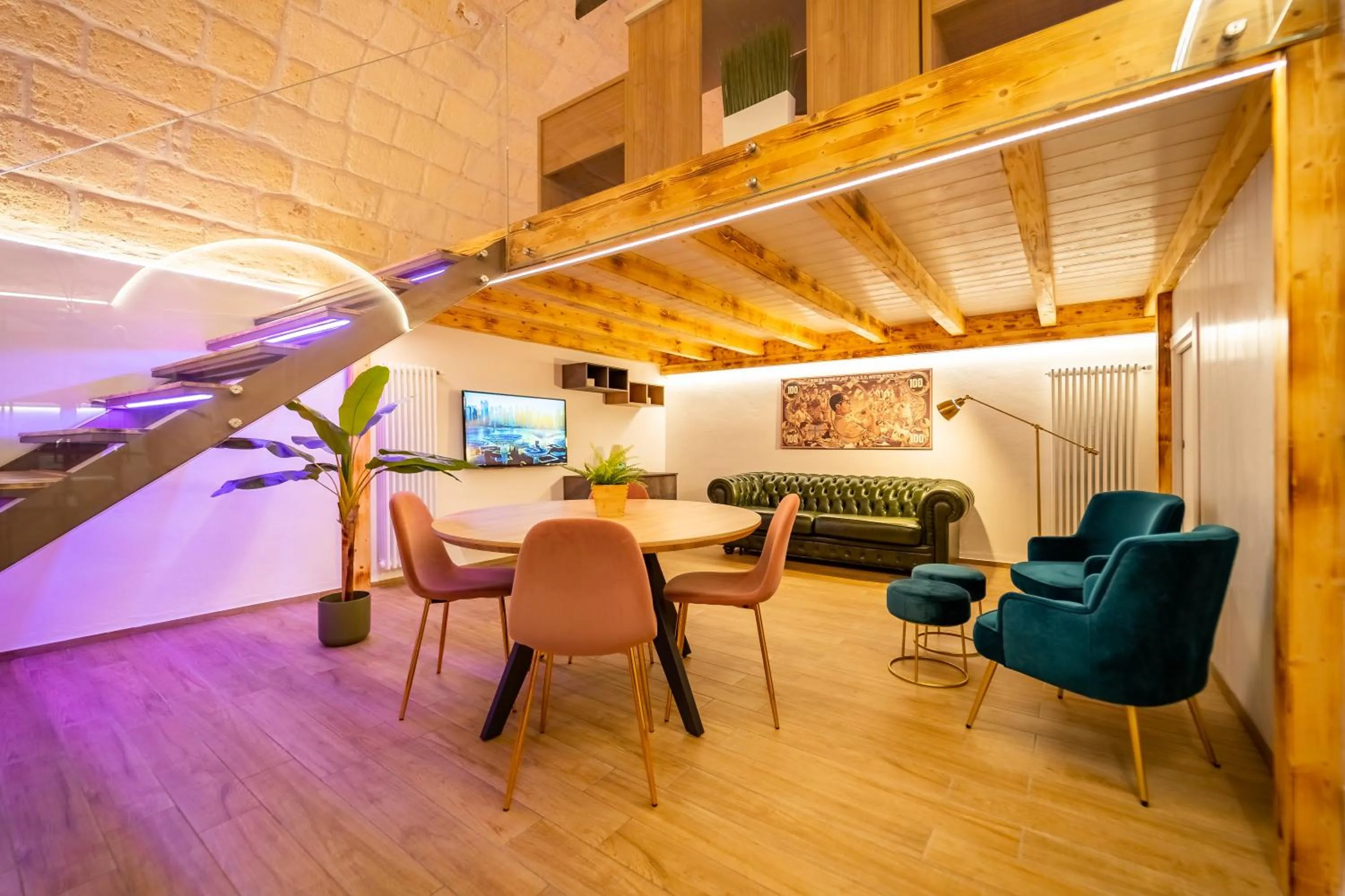 Communal lounge/ TV room in Il Melograno - Suite Deluxe