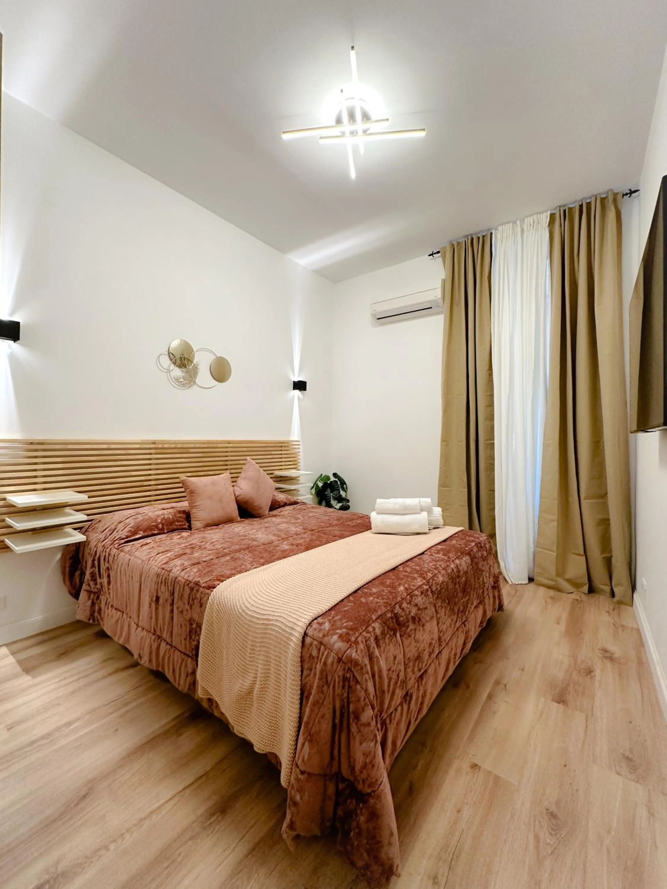 Bed in Colosseum Luxury Guest House